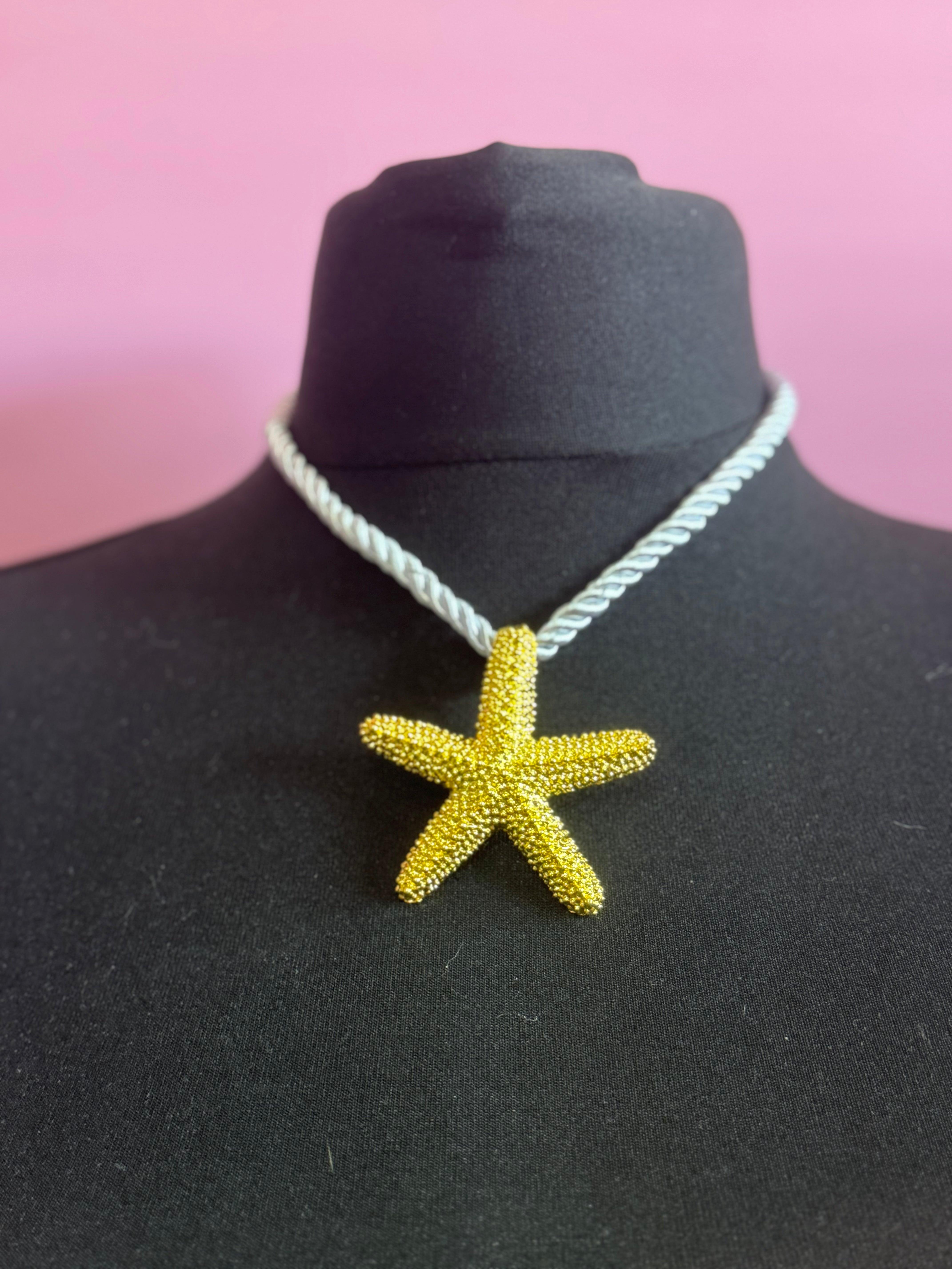 Big gold tone starfish nautical shell necklace on white cord