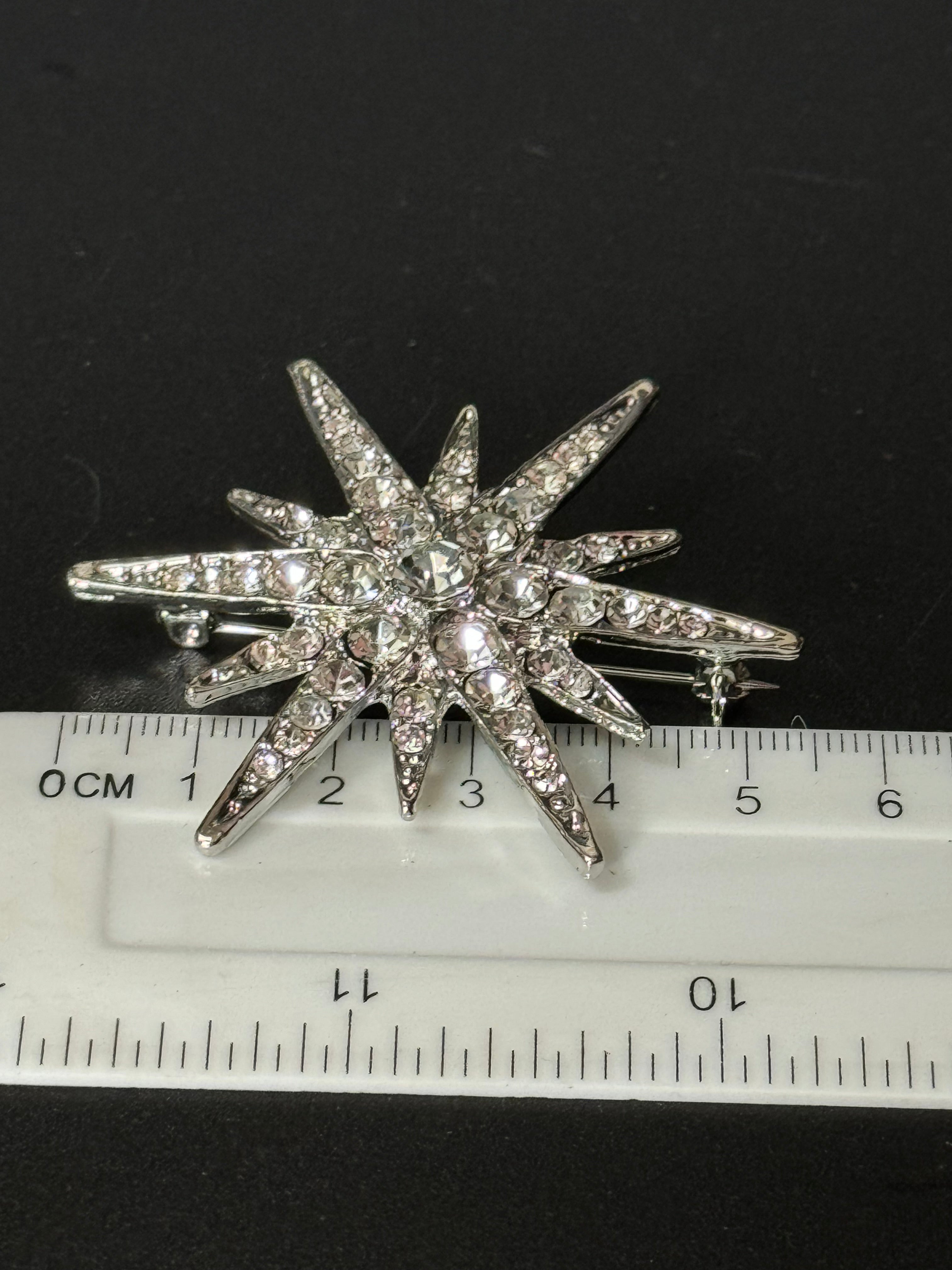 Large silver and clear diamanté combination star brooch and pendant