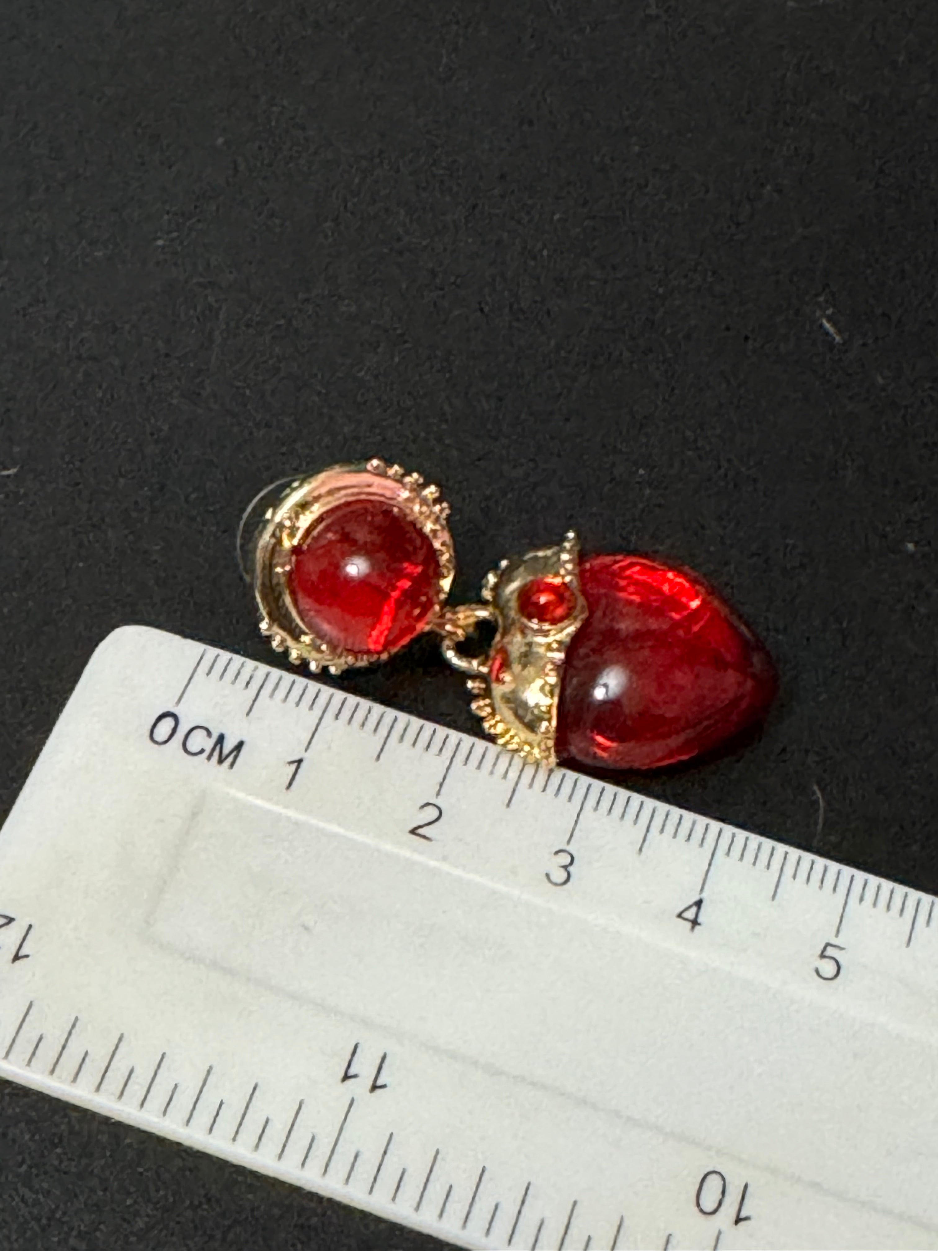 Oversized medieval style ruby red love heart cabochon drop earrings gold tone
