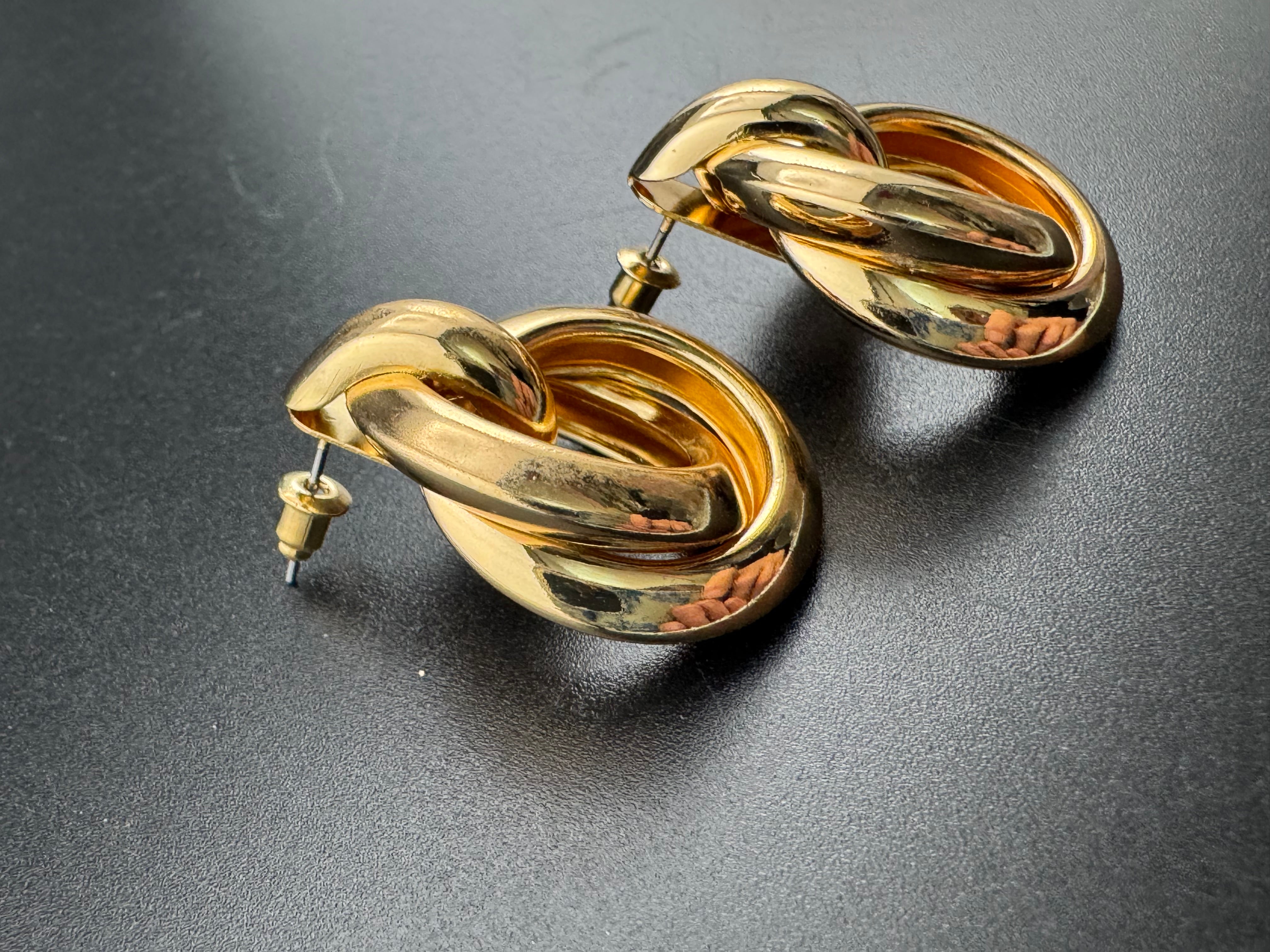 Gold tube door knocker knot stud earrings