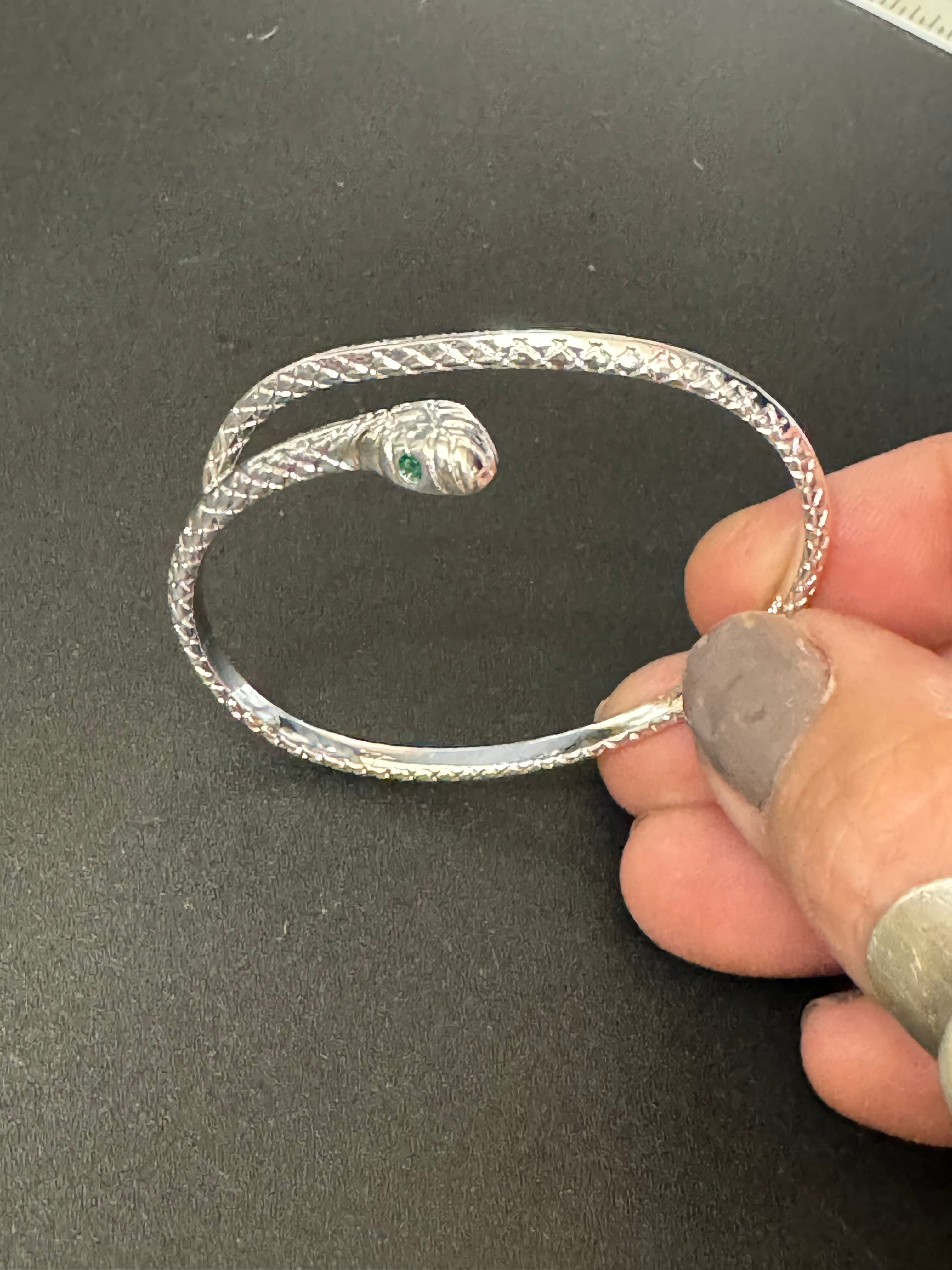 Silver plated snake bracelet with emerald eyes