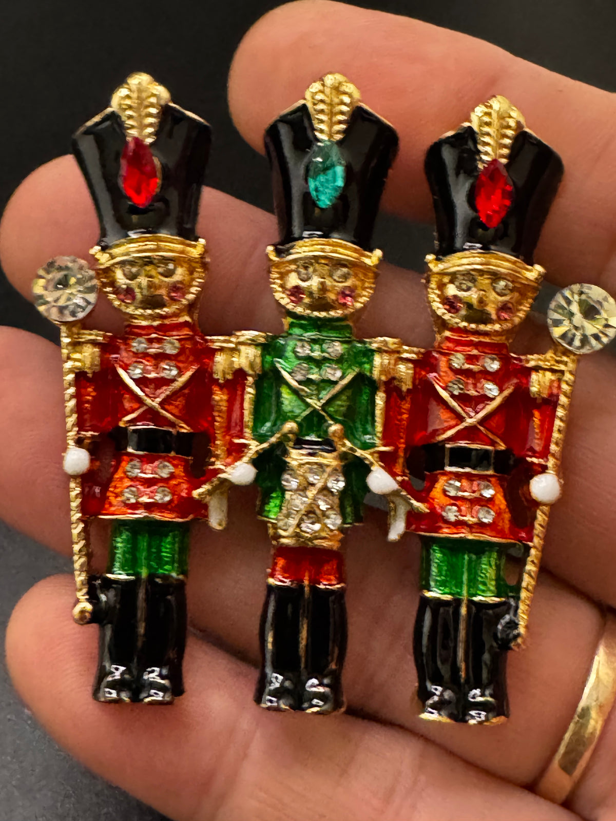Novelty diamanté nutcracker soldier enamel brooch, red and gold enamel, festive jewellery