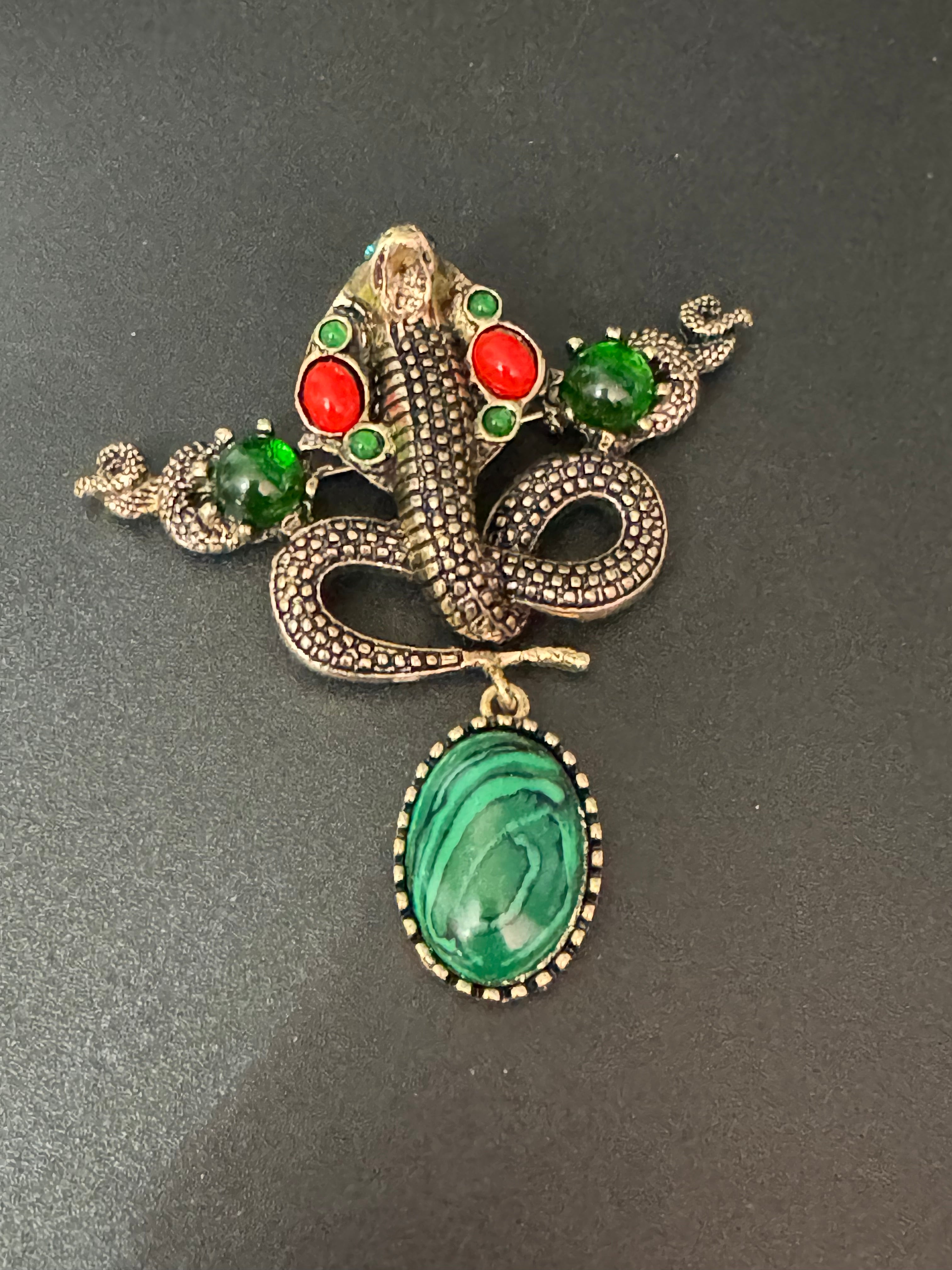 Oversized gold snake brooch with dropper and gemstones