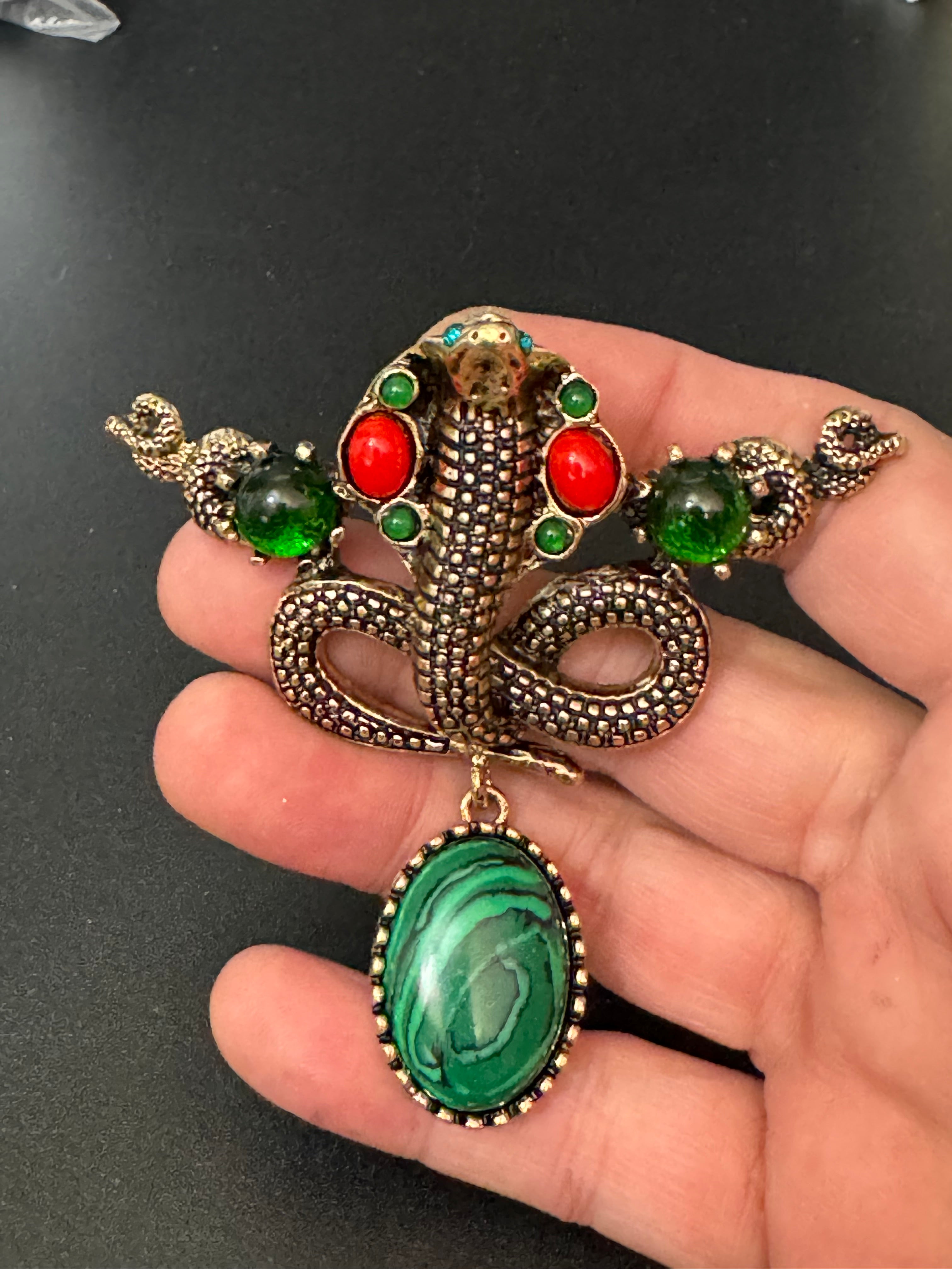 Oversized gold snake brooch with dropper and gemstones