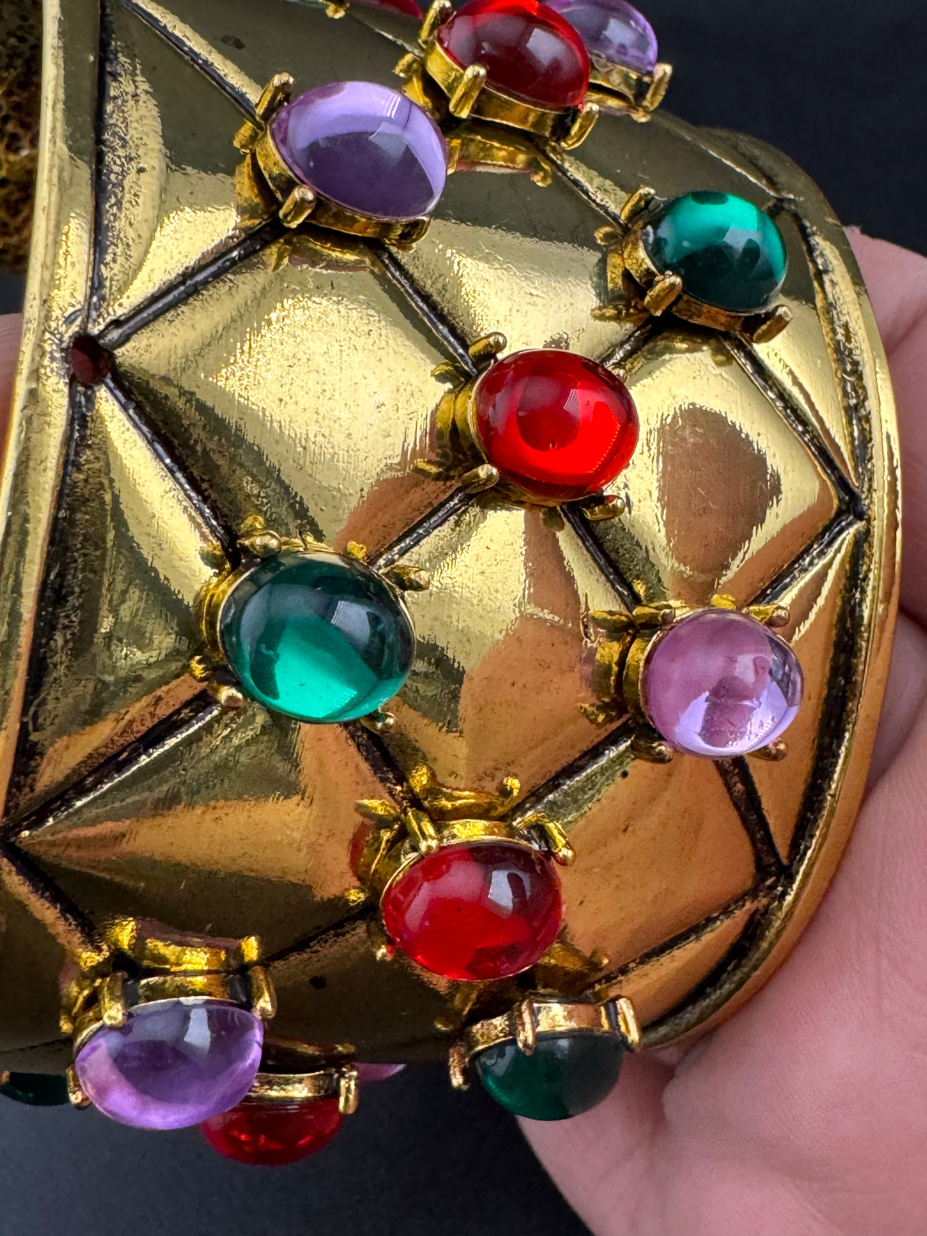 Etruscan style oversized open wide gold metal cushion cuff bangle with purple green red oval cabochons, medieval vibes