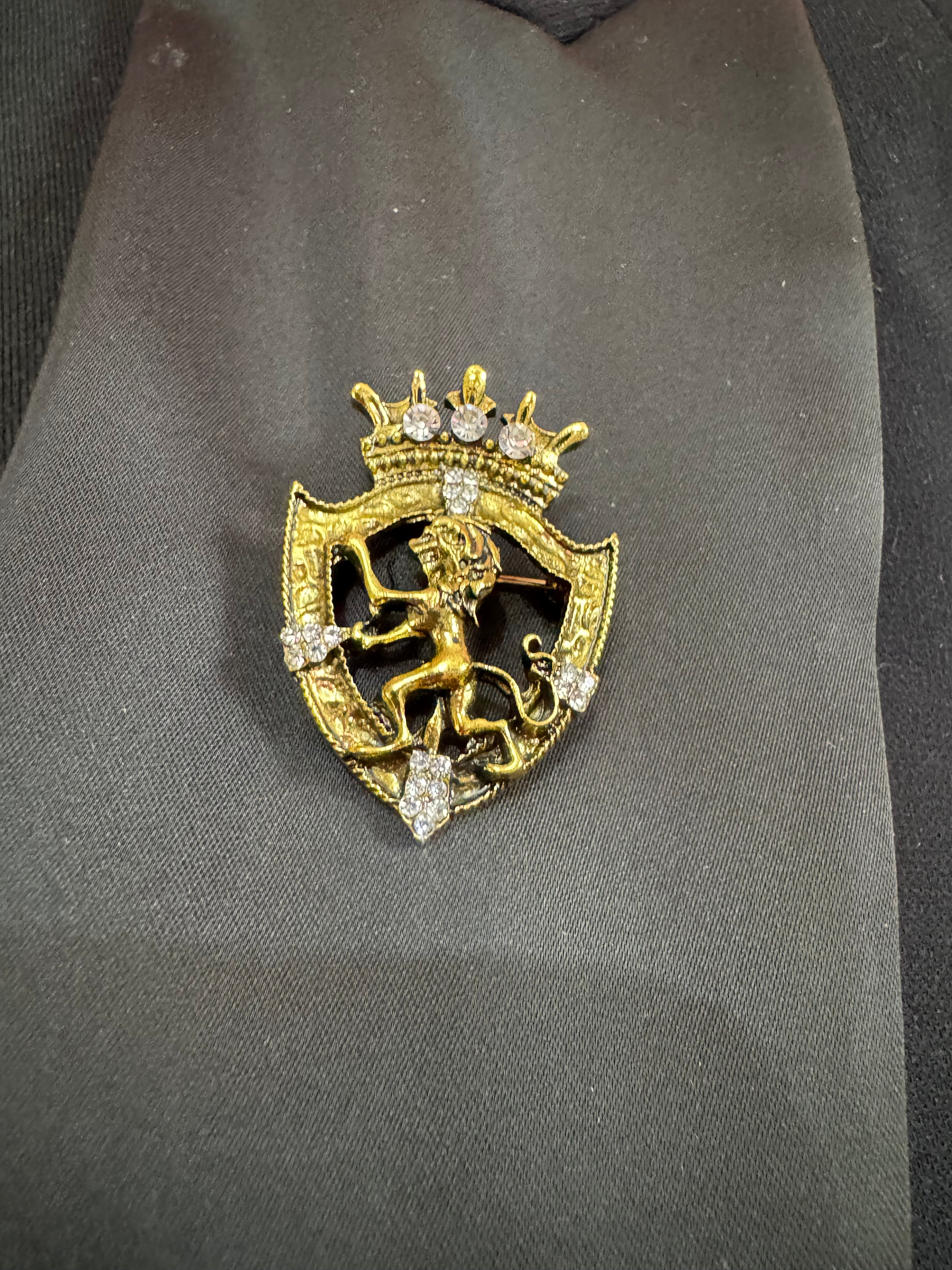 Crystal rampant lion shield brooch, antique gold tone