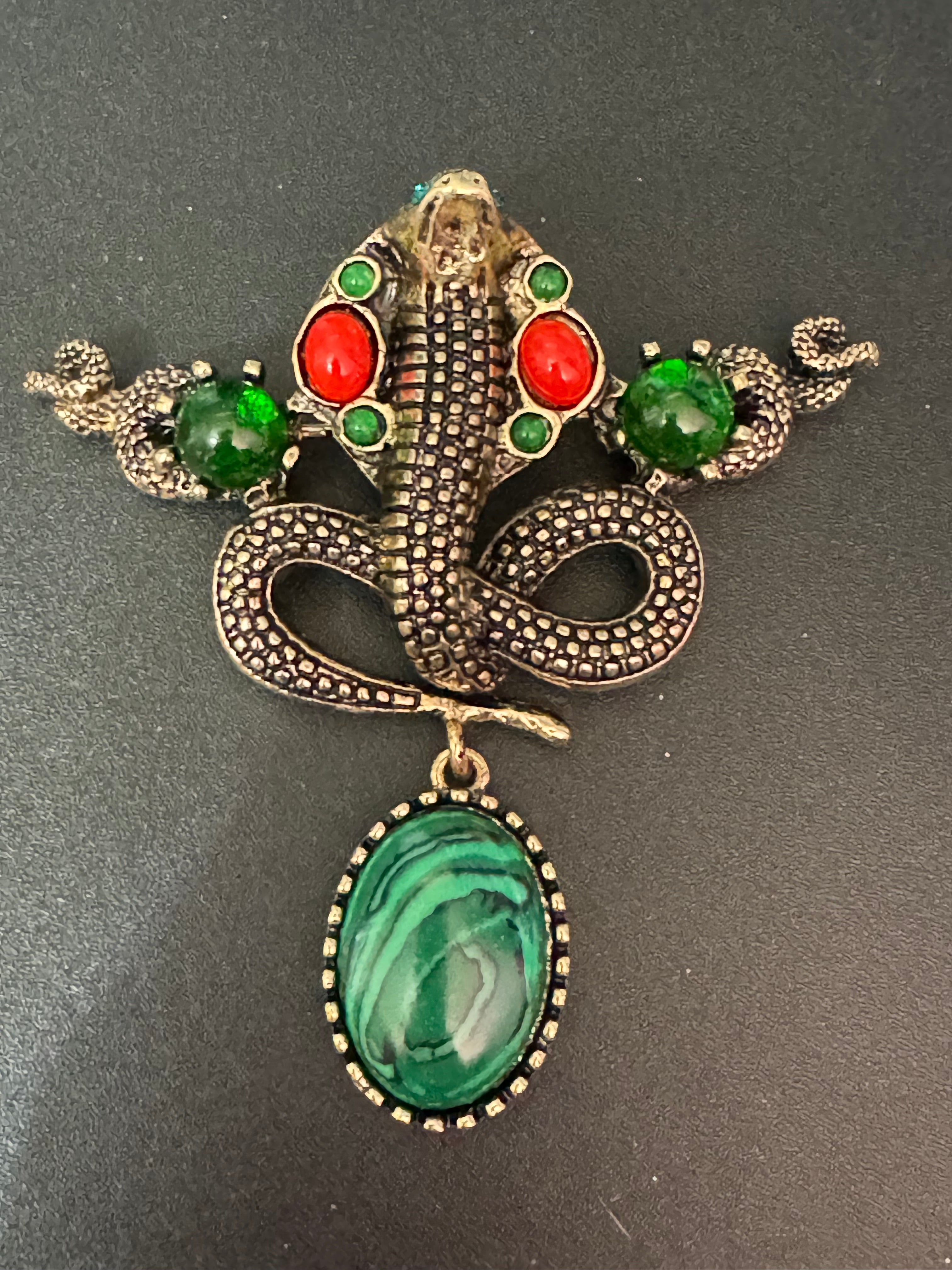 Oversized gold snake brooch with dropper and gemstones