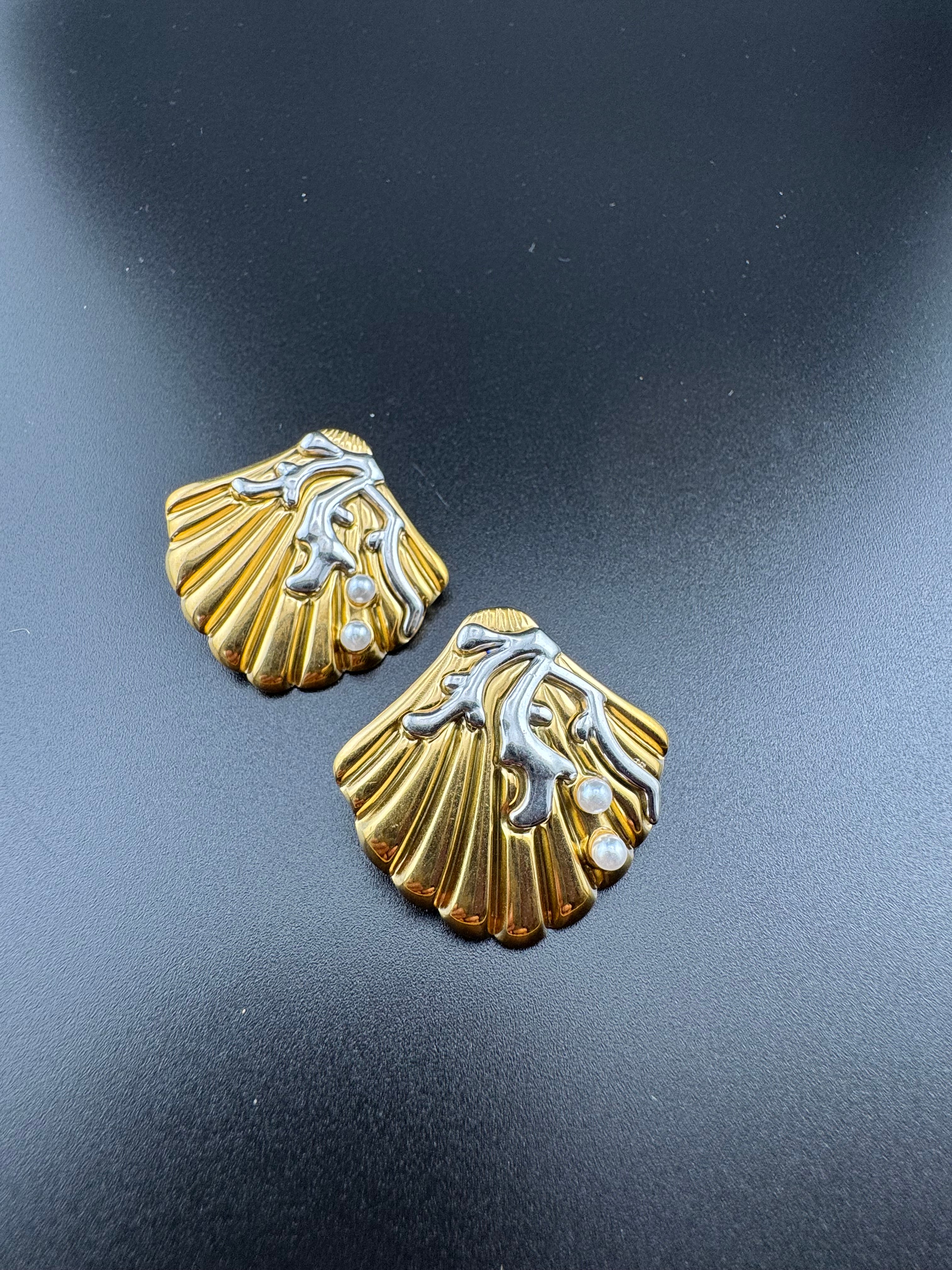 Nautical gold and silver-toned pearl seashell earrings, pierced.