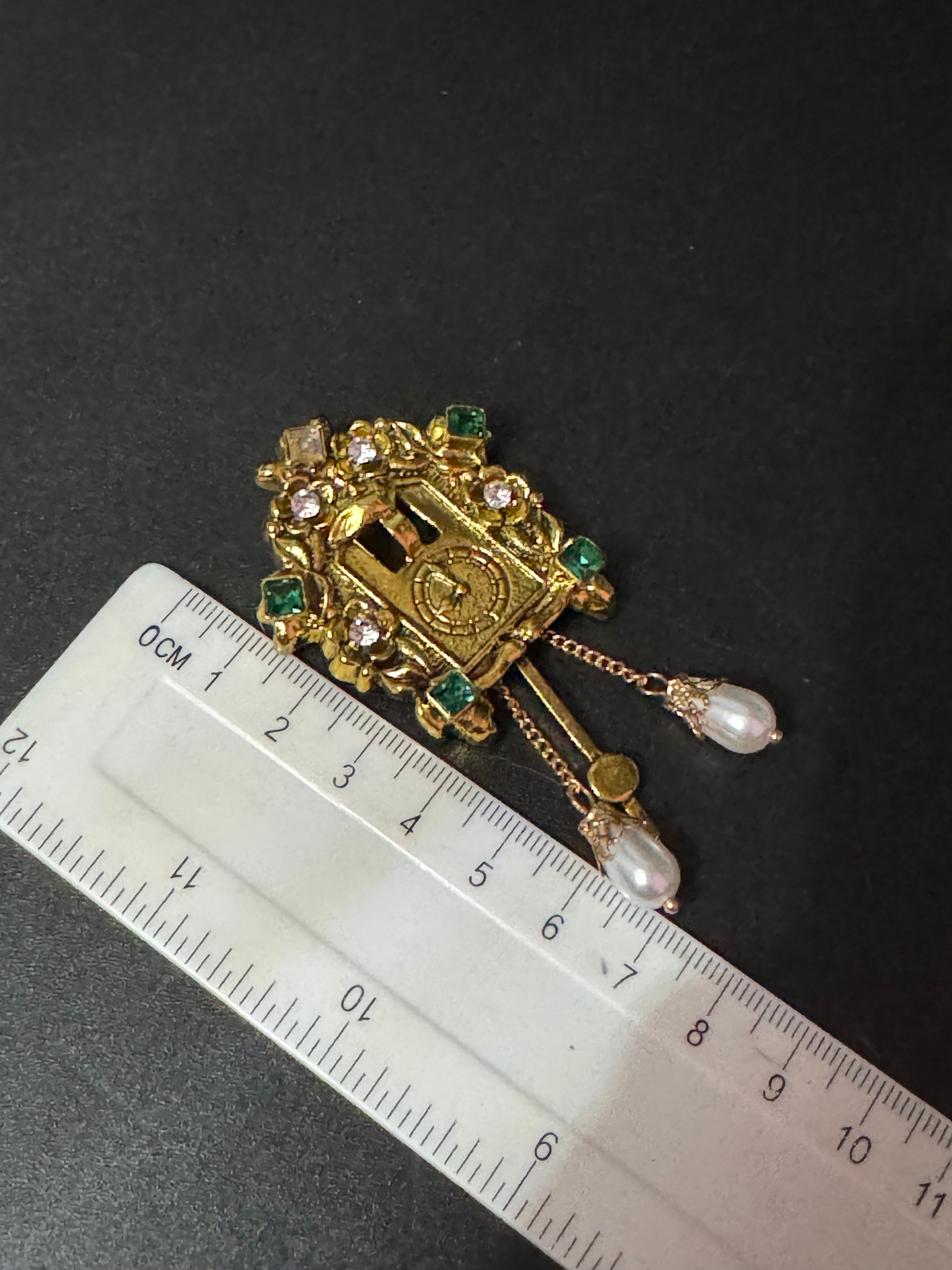 Combination novelty cuckoo clock brooch and pendant gold