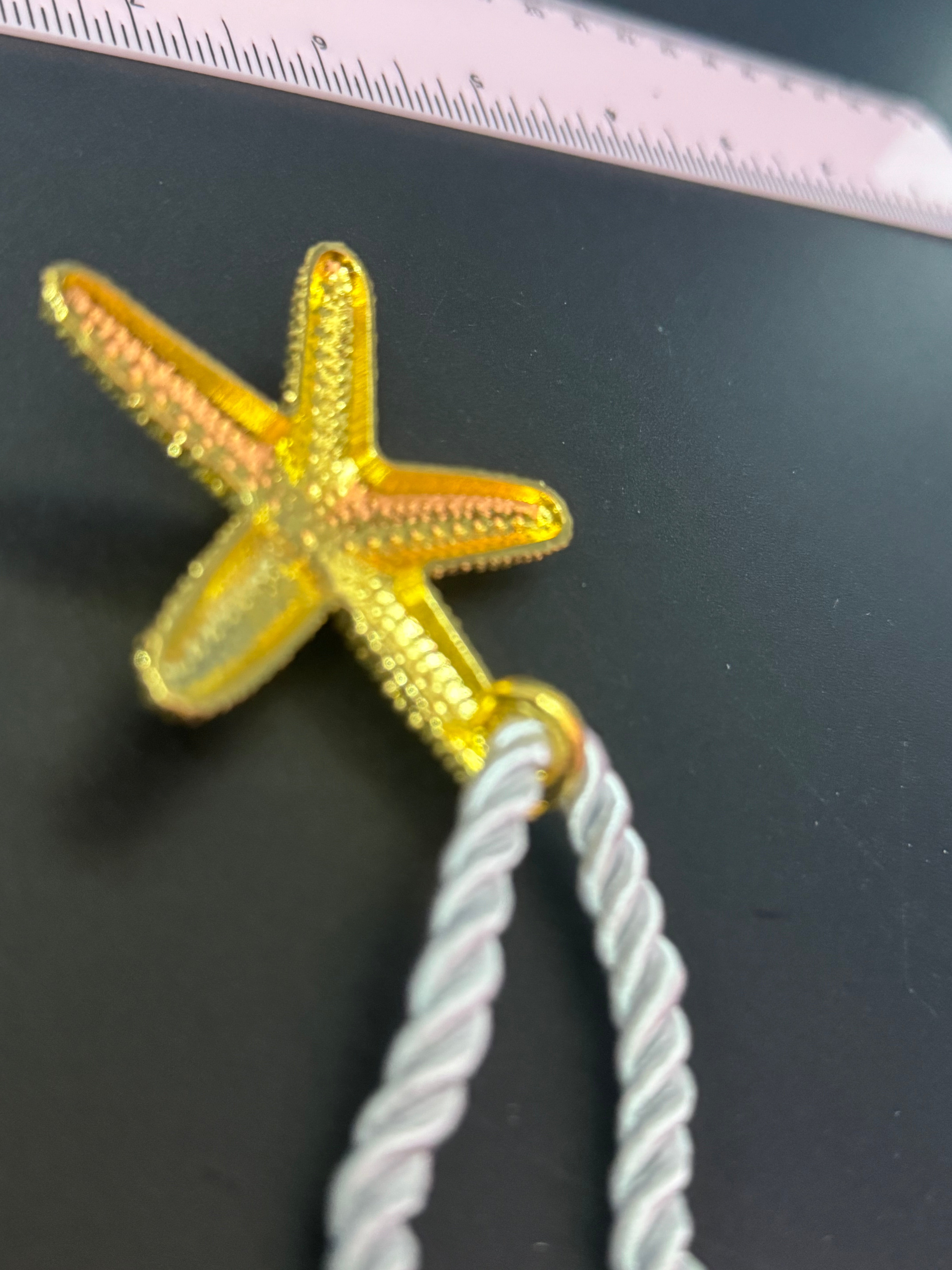 Big gold tone starfish nautical shell necklace on white cord