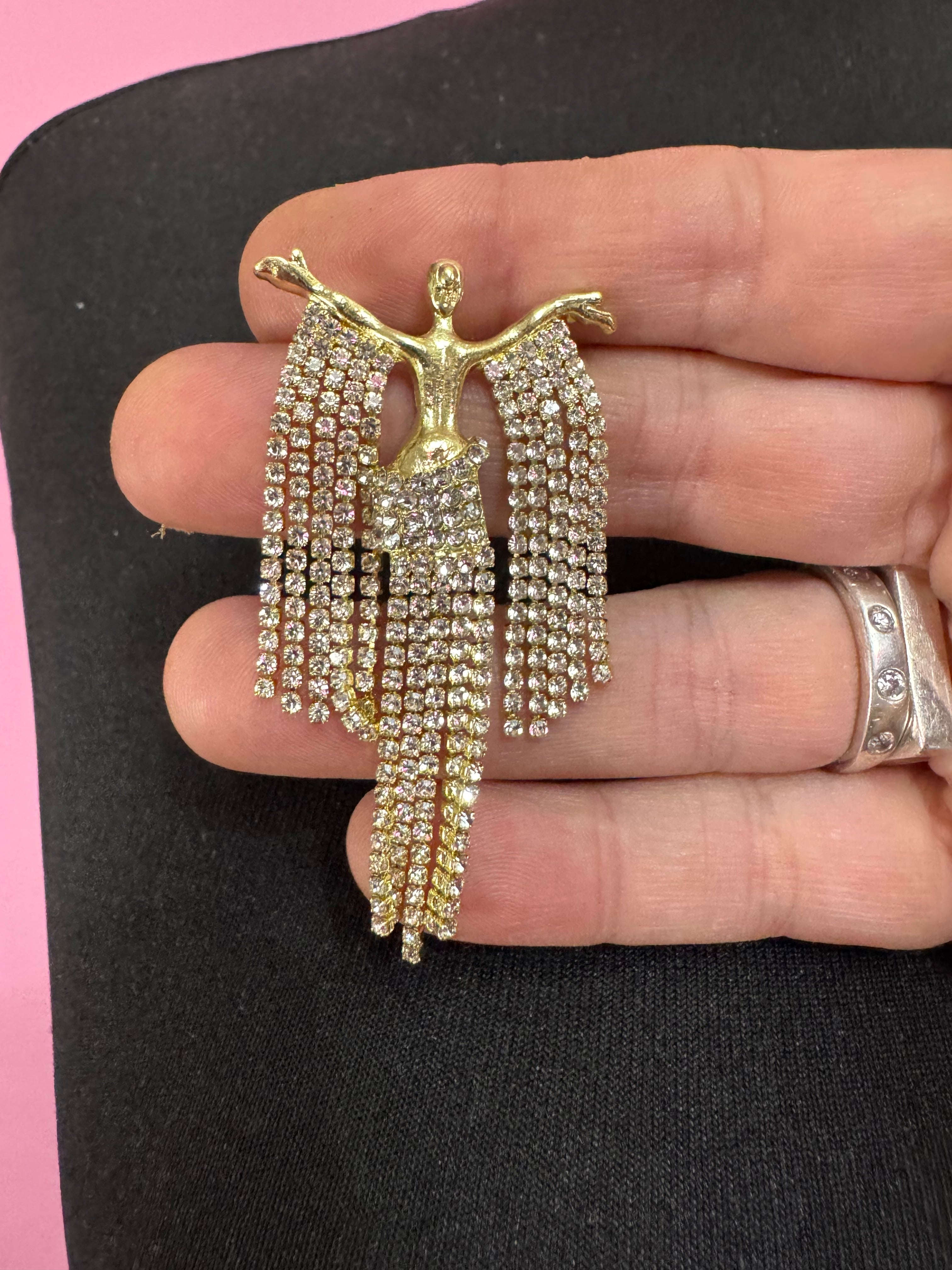 Gold rhinestone diva brooch, diamanté lady waterfall pin