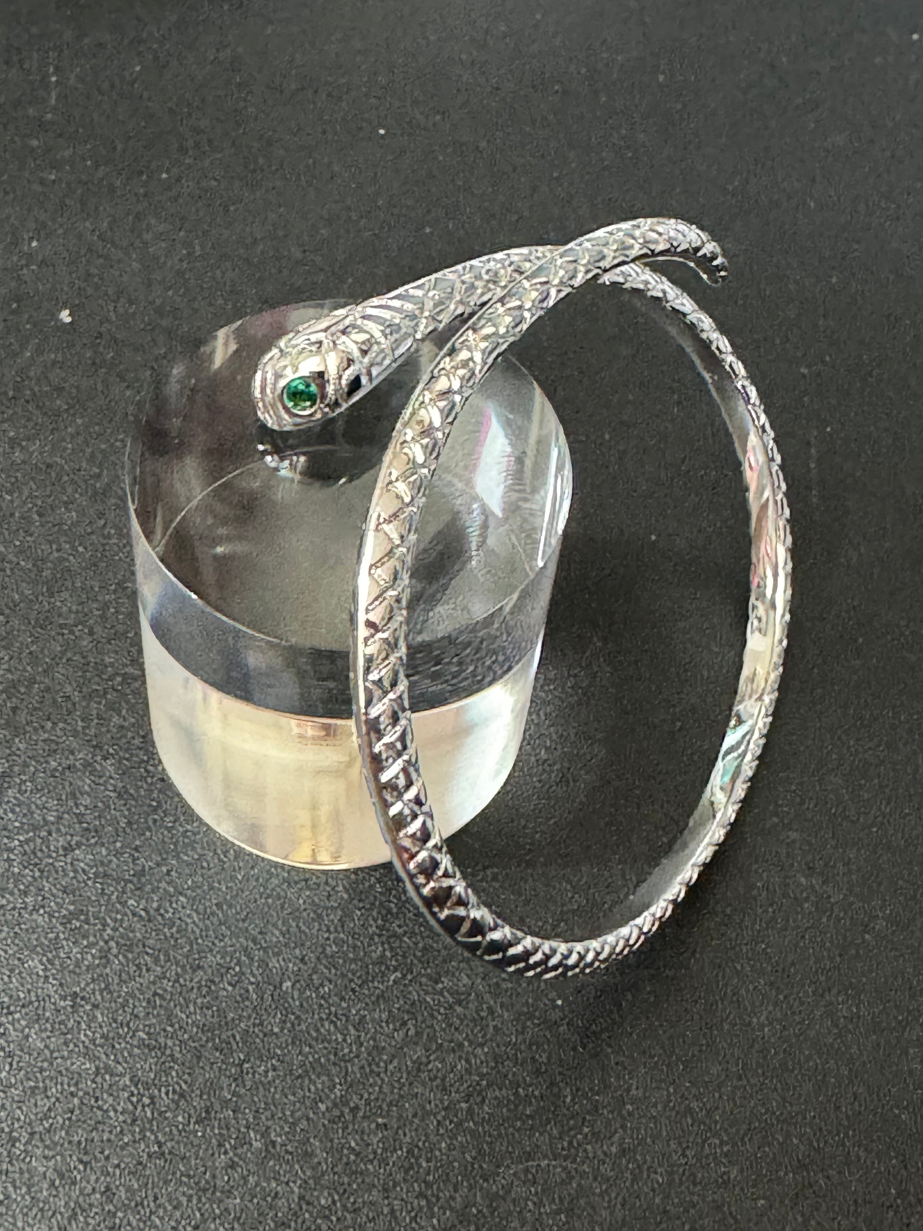 Silver plated snake bracelet with emerald eyes