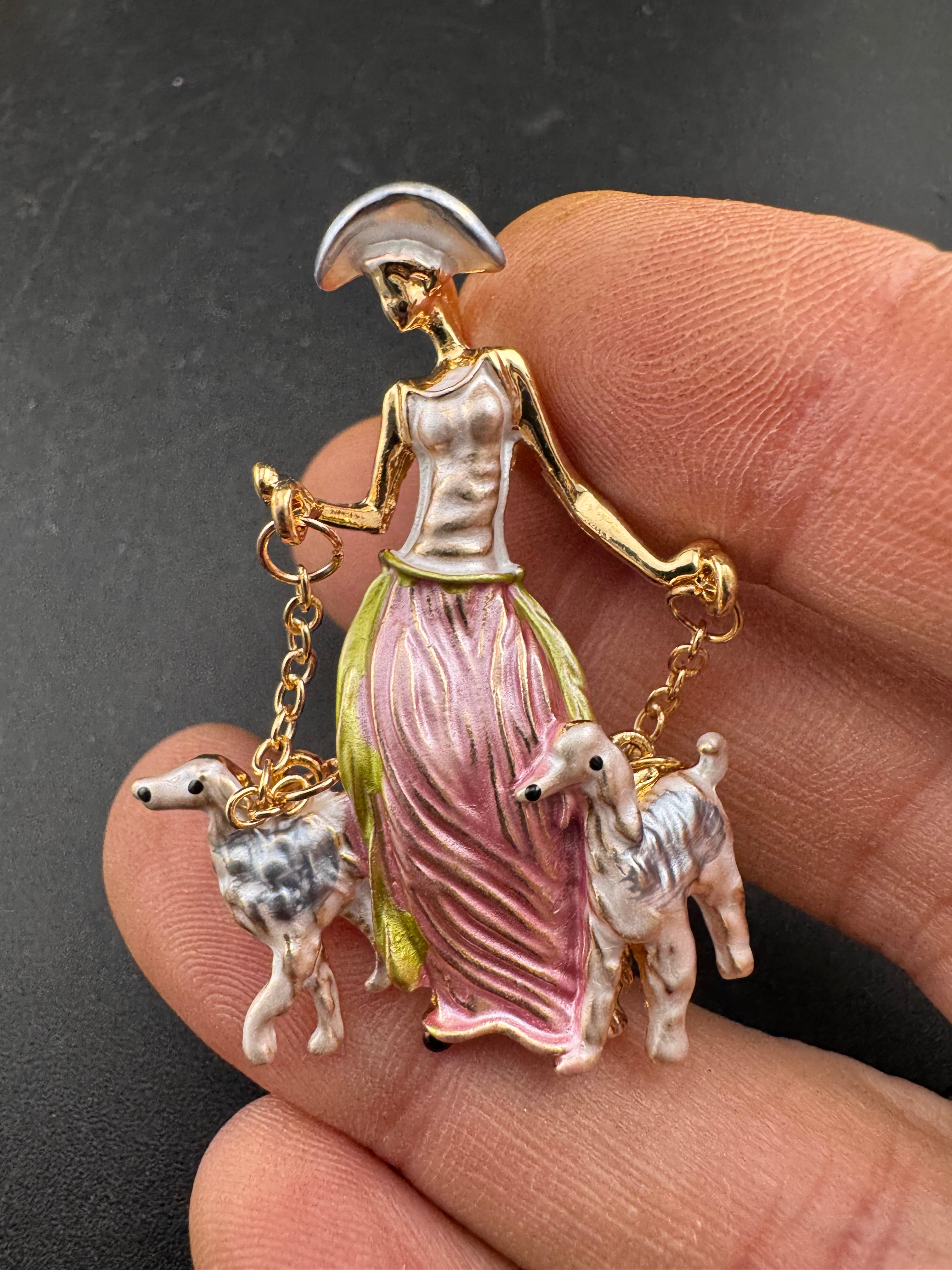 Pink art deco lady with french poodle dogs on leads brooch