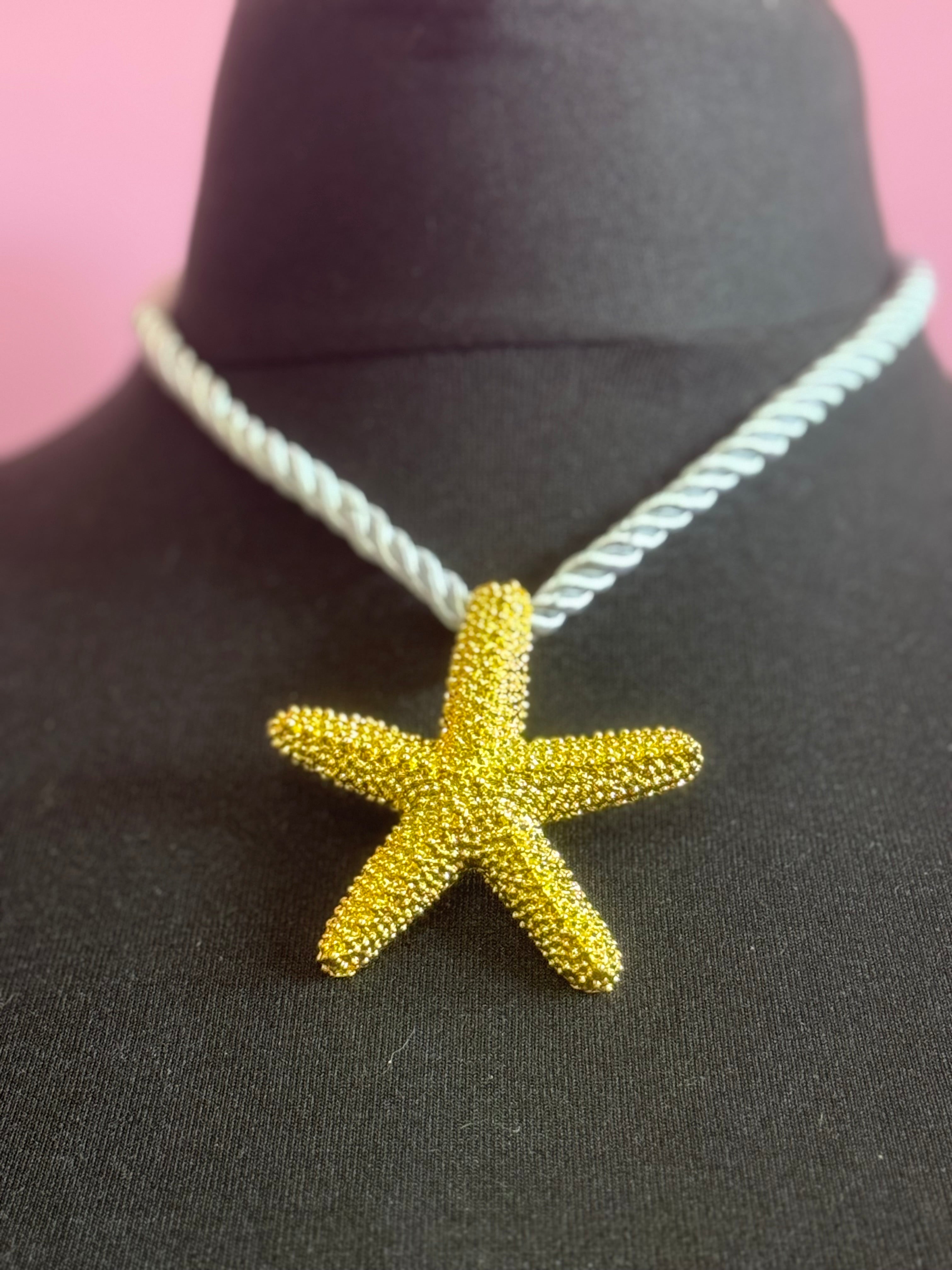 Big gold tone starfish nautical shell necklace on white cord