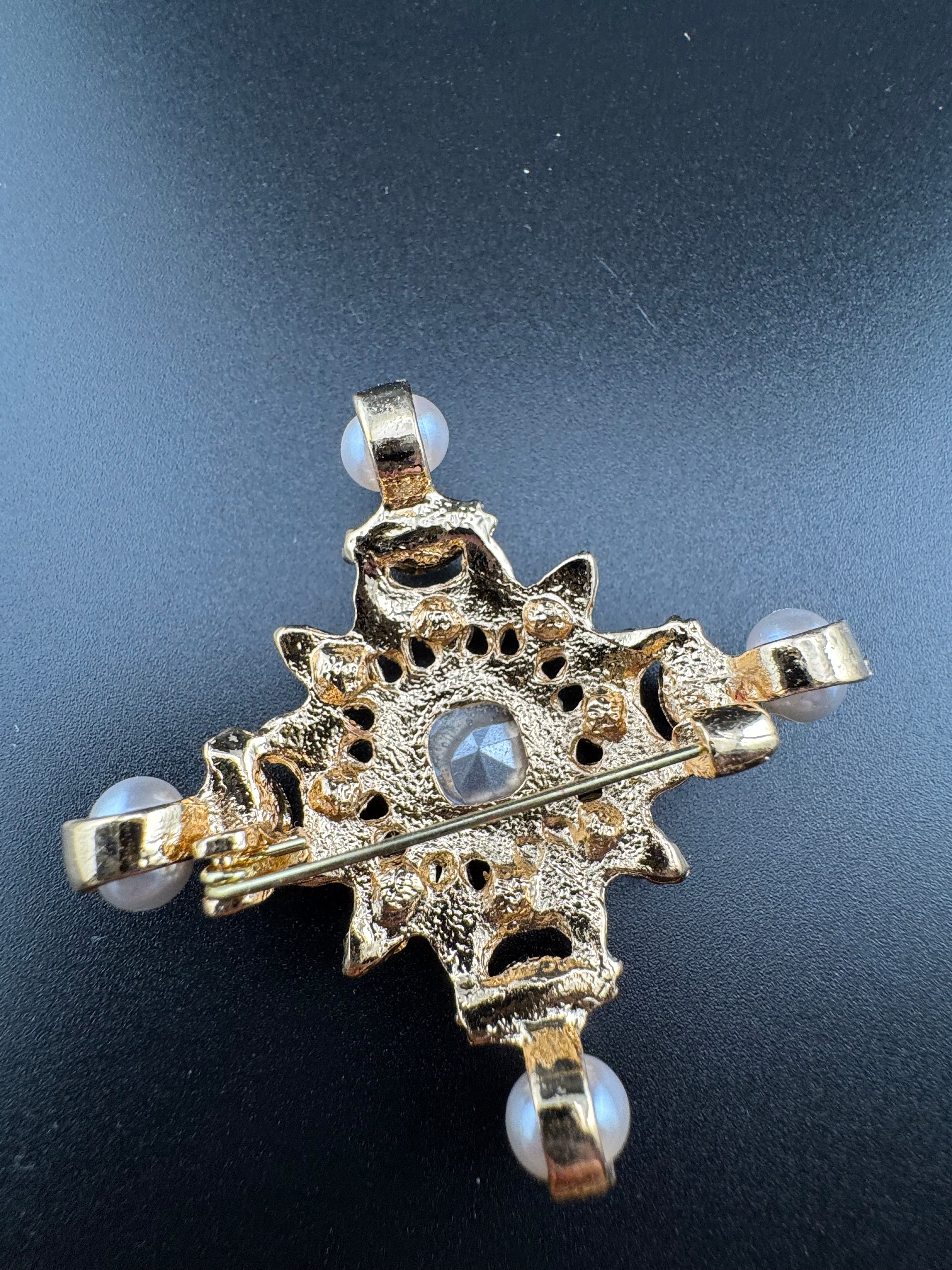 Statement Medieval style gold pink and green rhinestone cross brooch