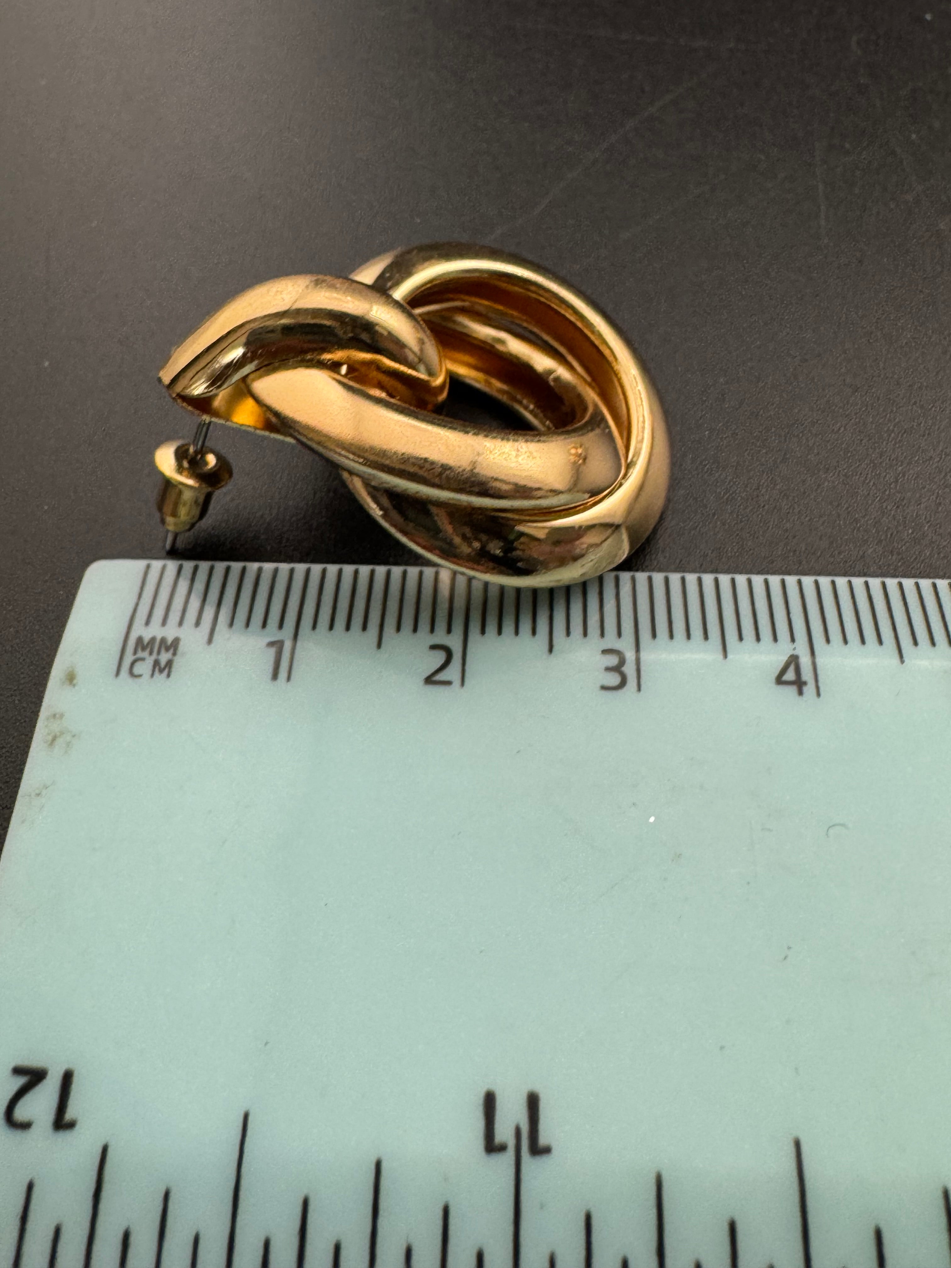 Gold tube door knocker knot stud earrings