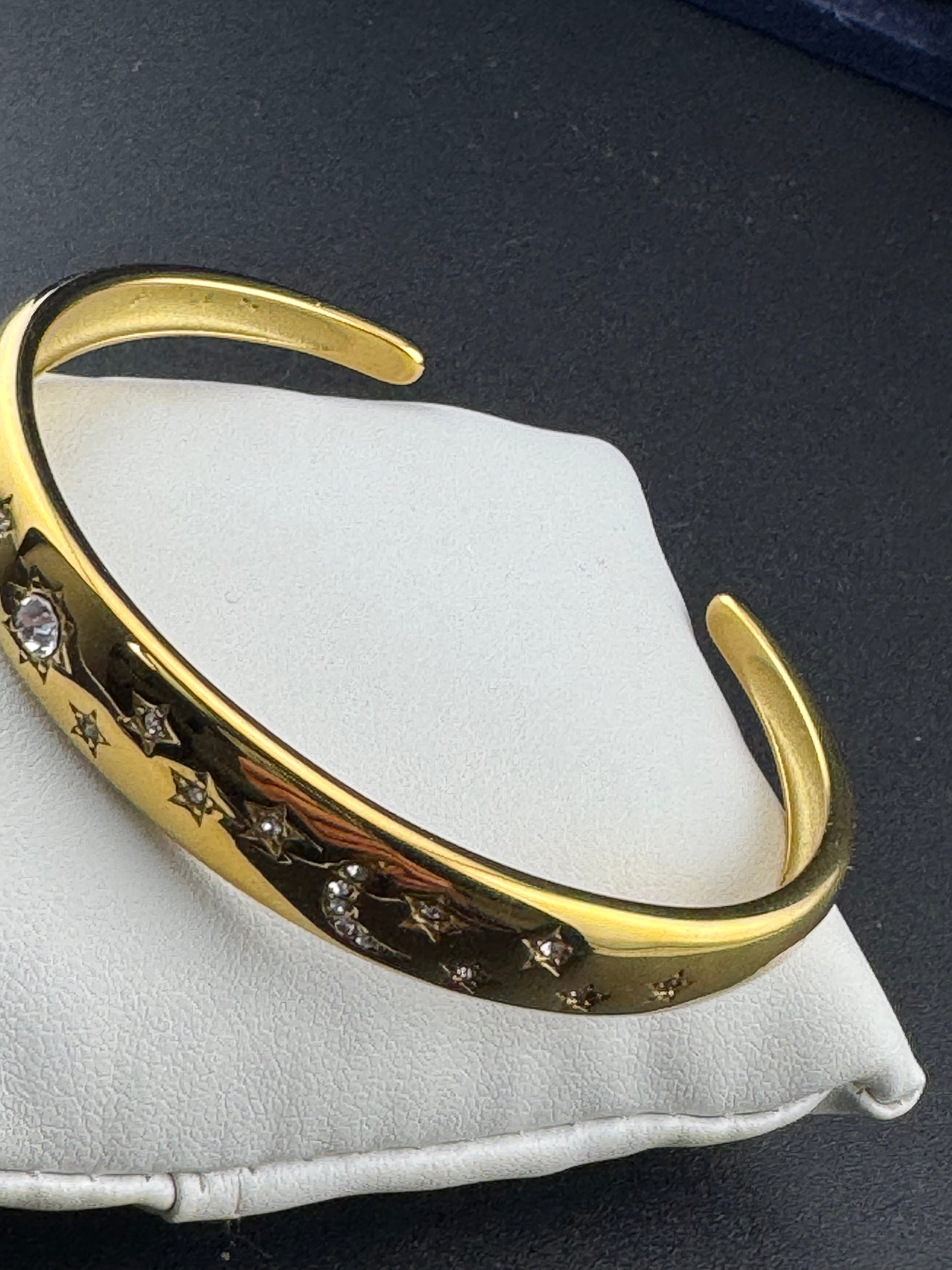 Sun Moon & Stars gold plated open bangle