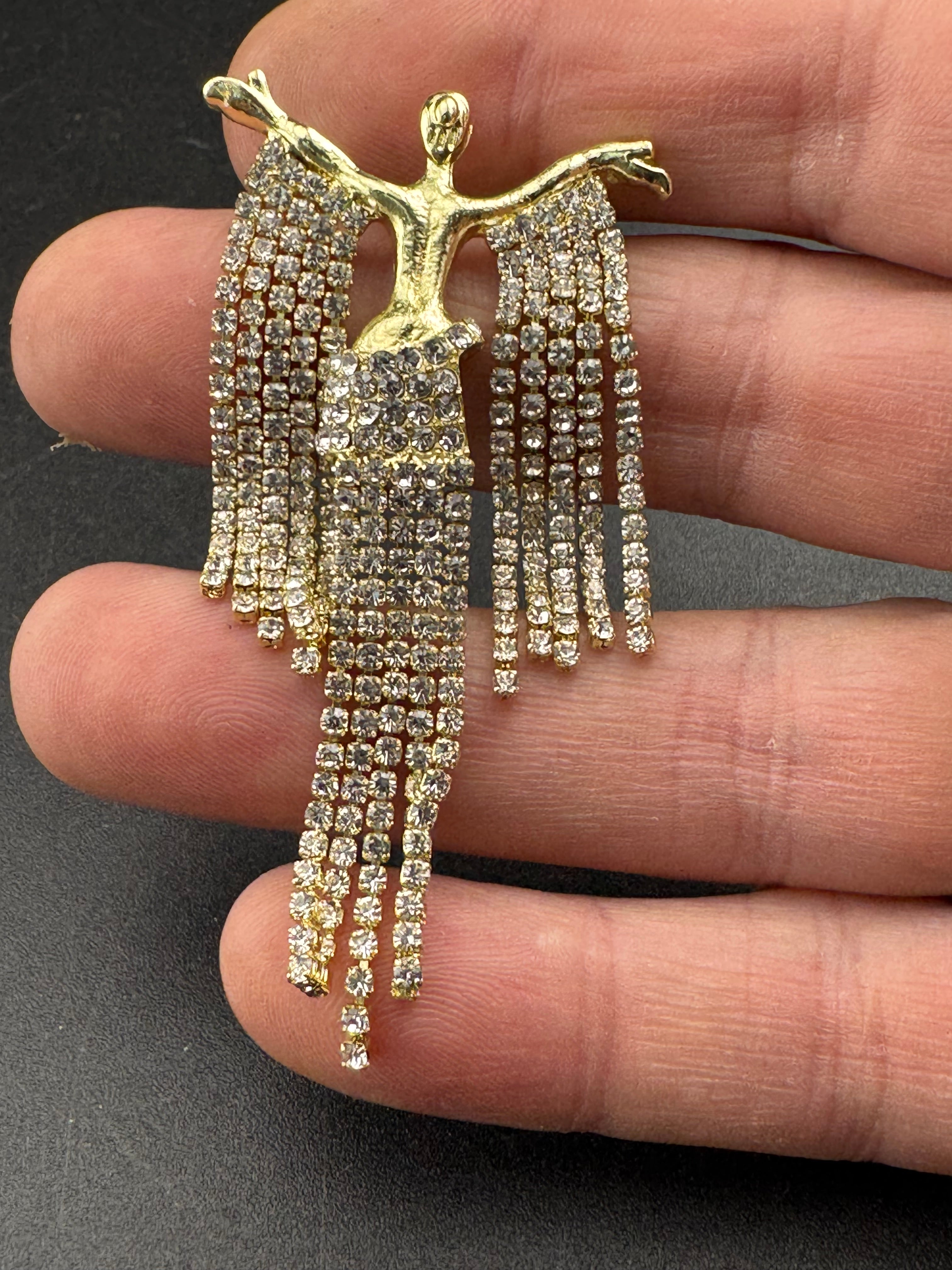 Gold rhinestone diva brooch, diamanté lady waterfall pin