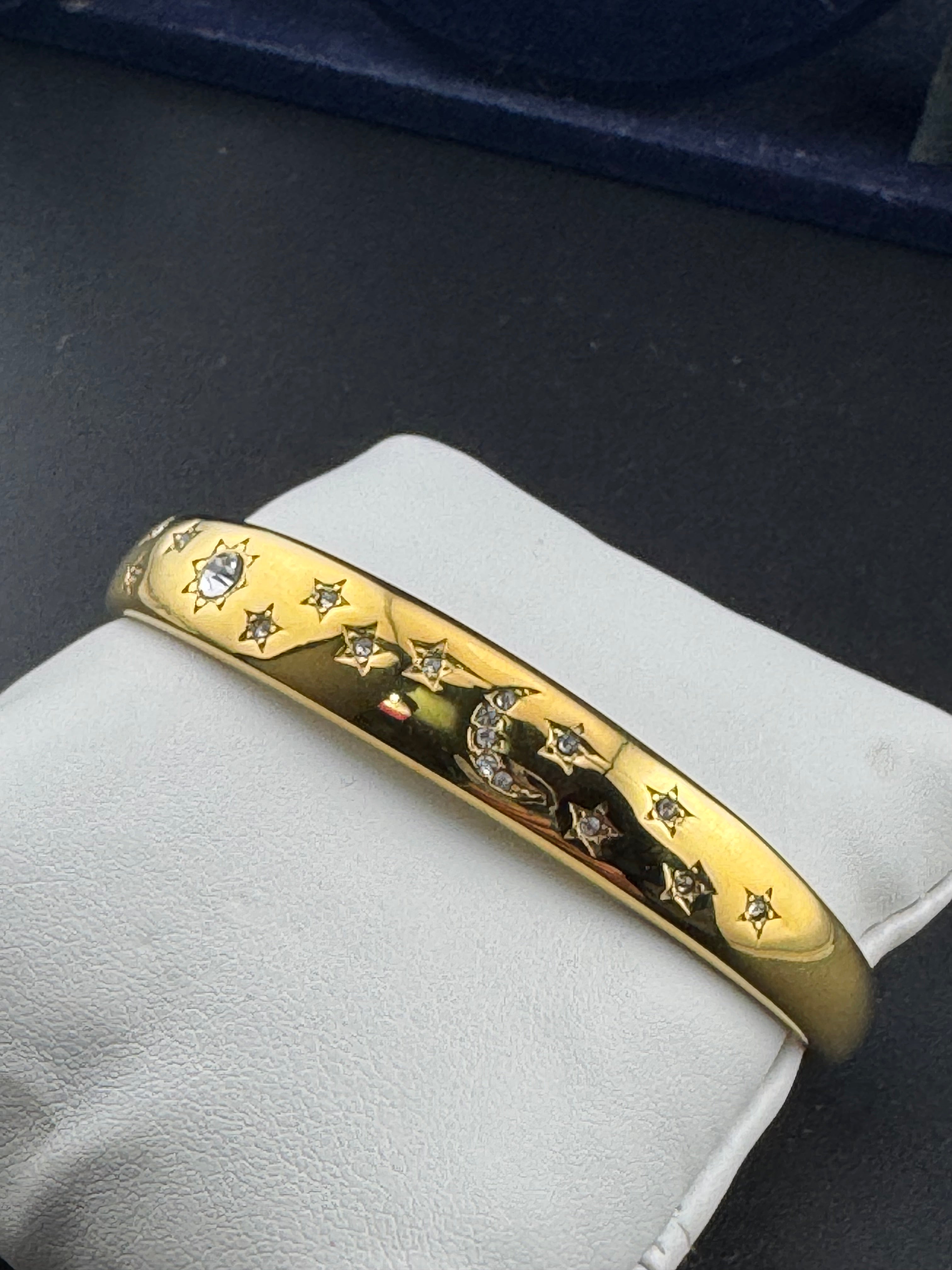 Sun Moon & Stars gold plated open bangle