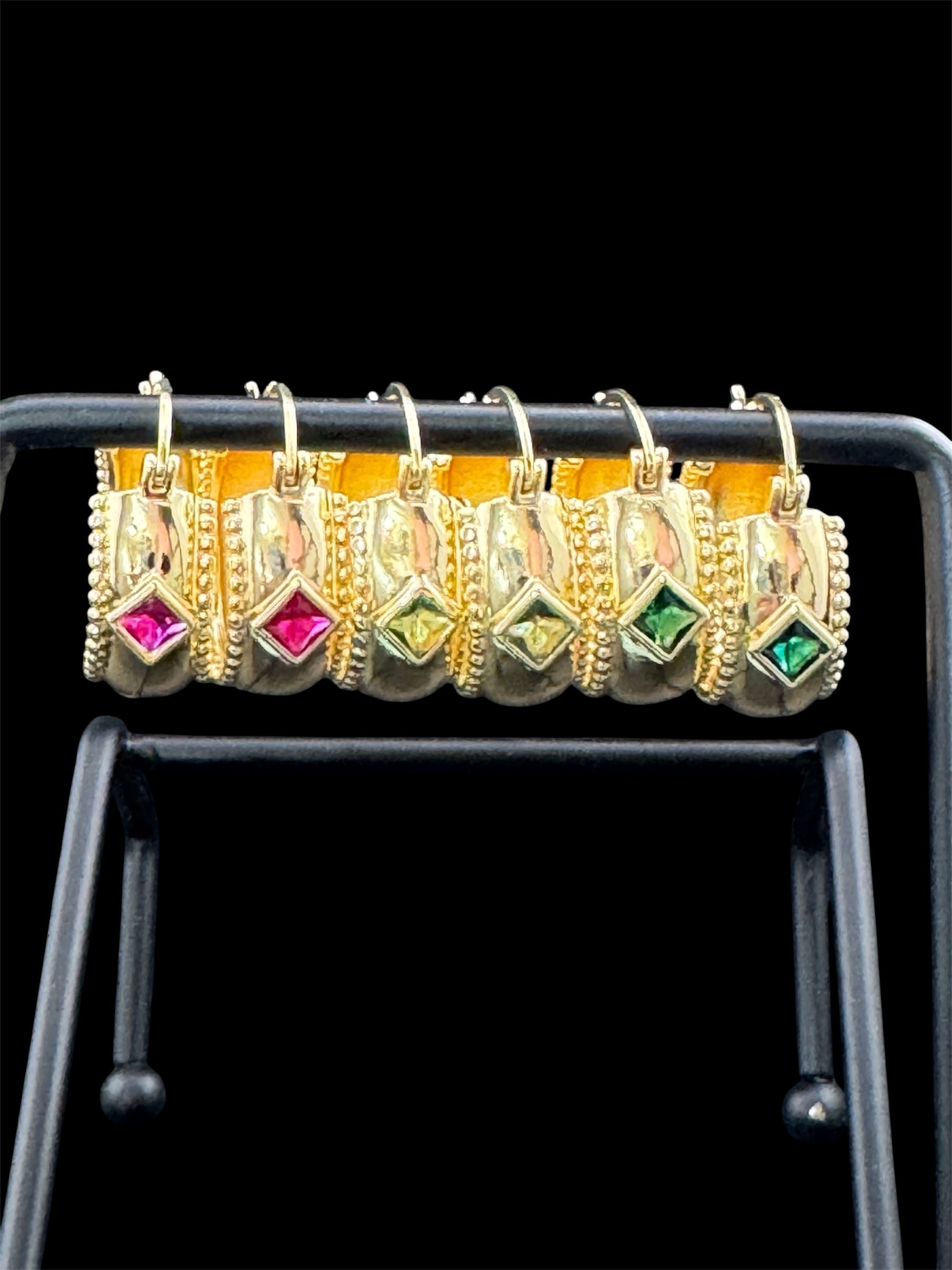 Wide crystal gold hoop earrings with pink emerald and tourmaline crystals