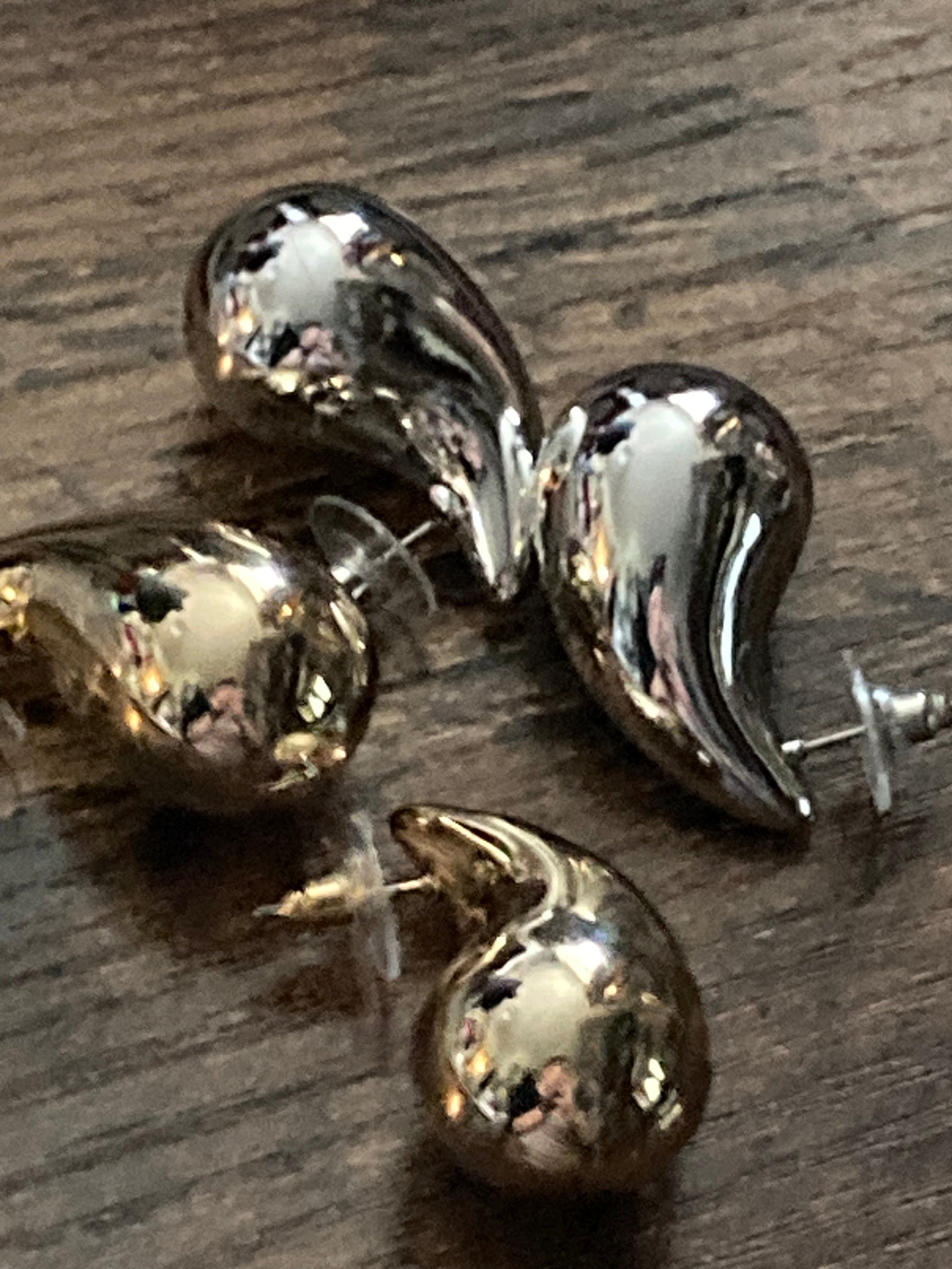Silver tone oversized high sheen dome earrings comma teardrop shaped