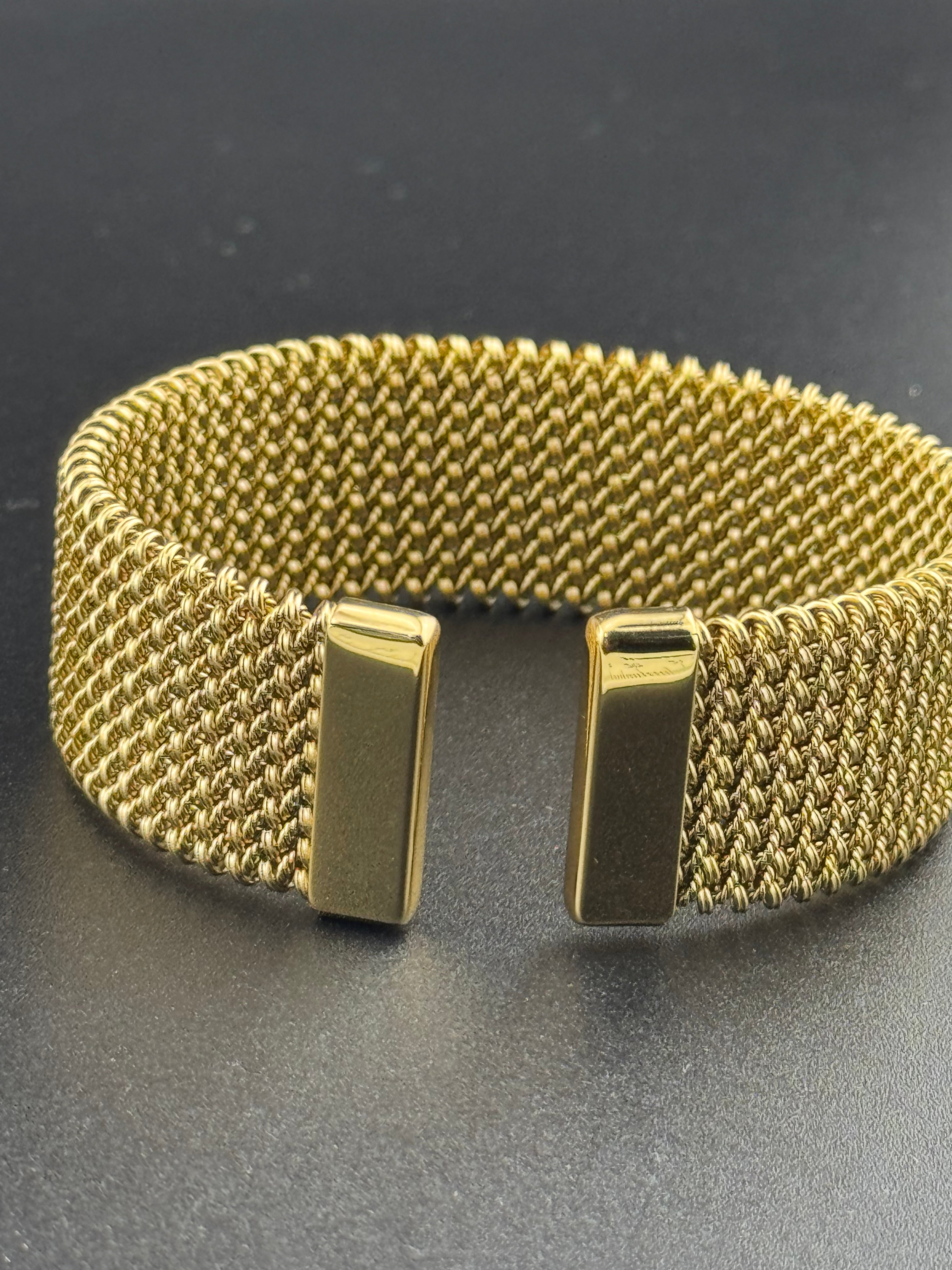 Wide gold toned mesh link open bangle bracelet vintage style