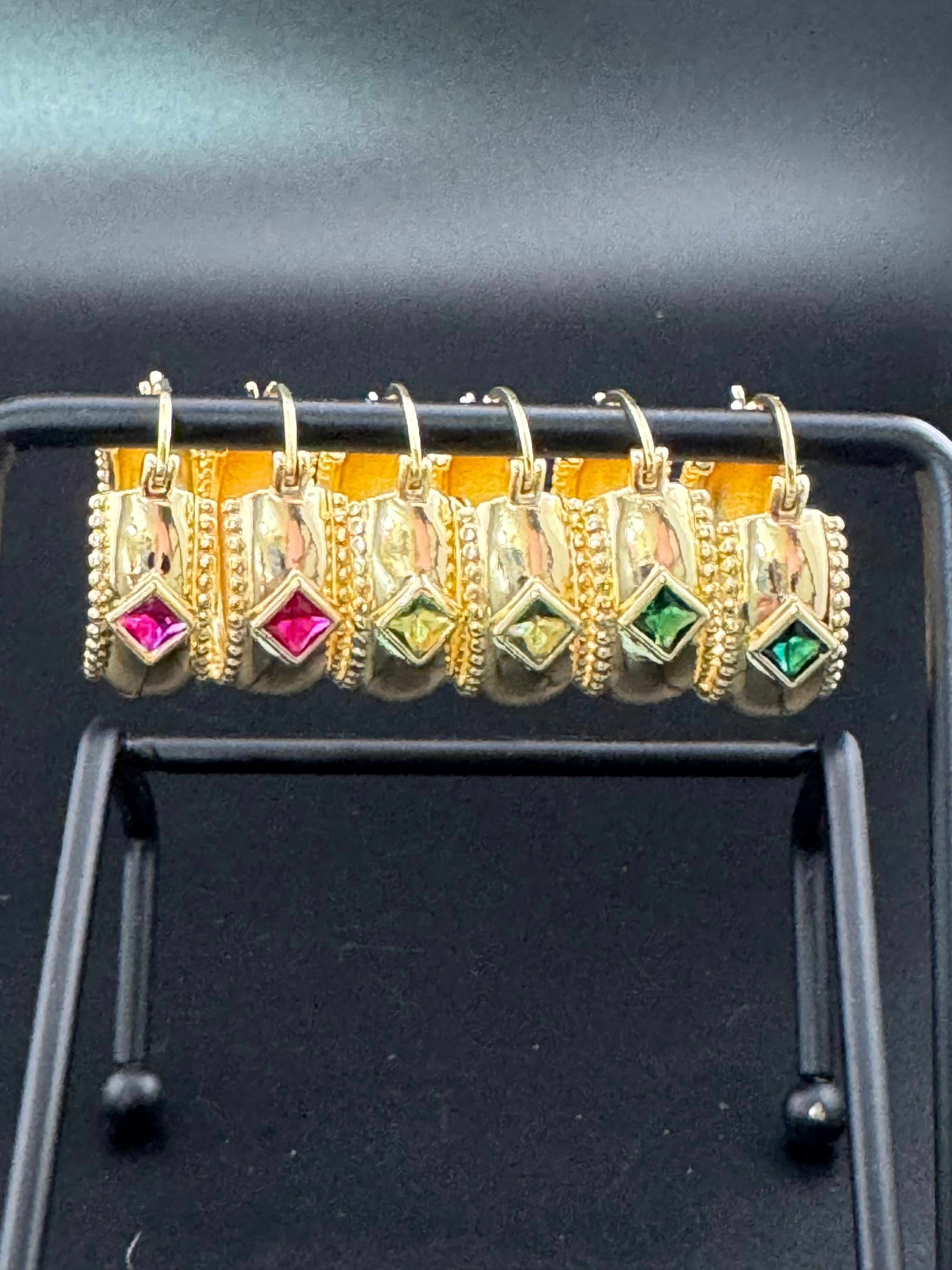Wide crystal gold hoop earrings with pink emerald and tourmaline crystals