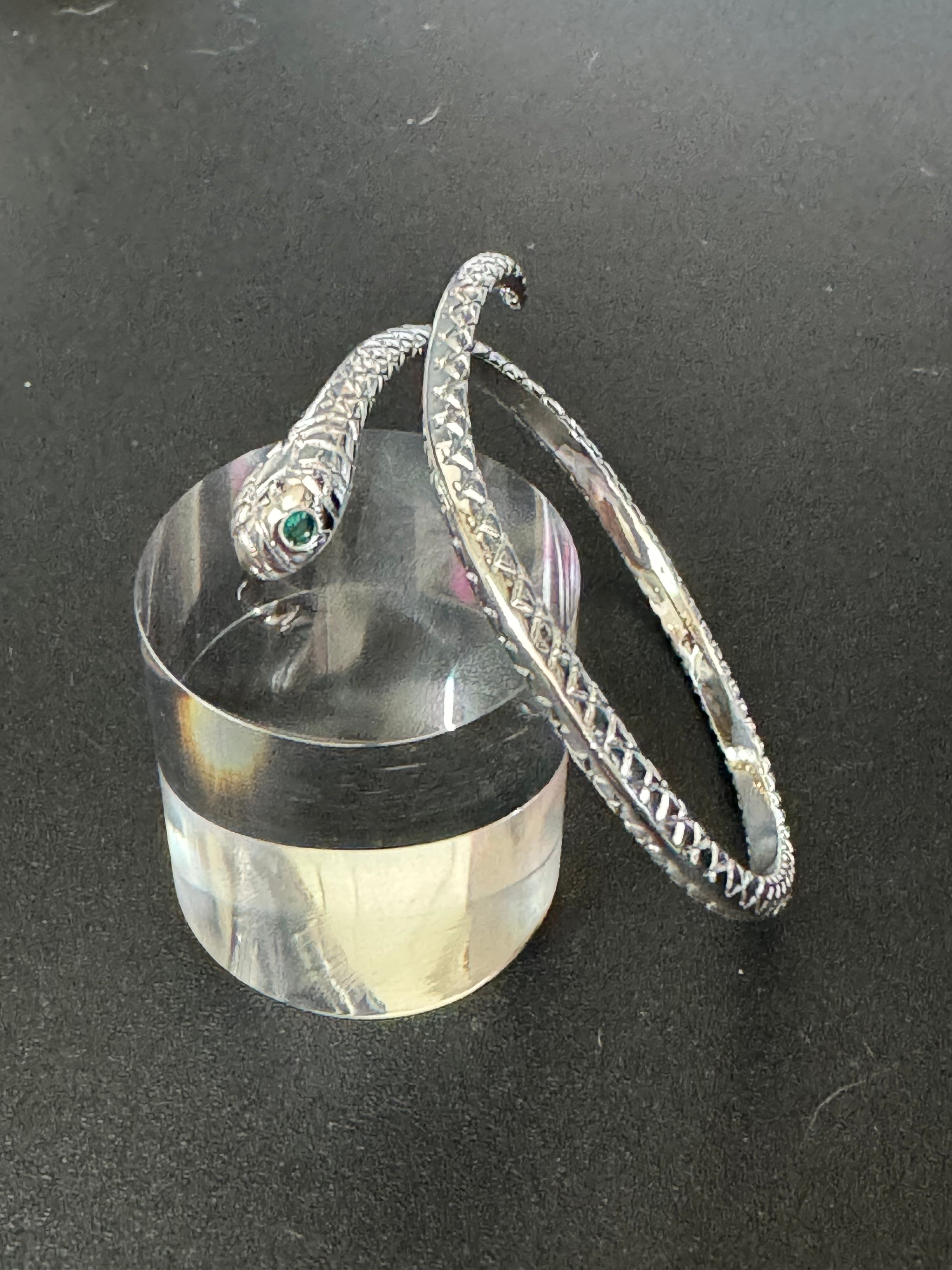Silver plated snake bracelet with emerald eyes
