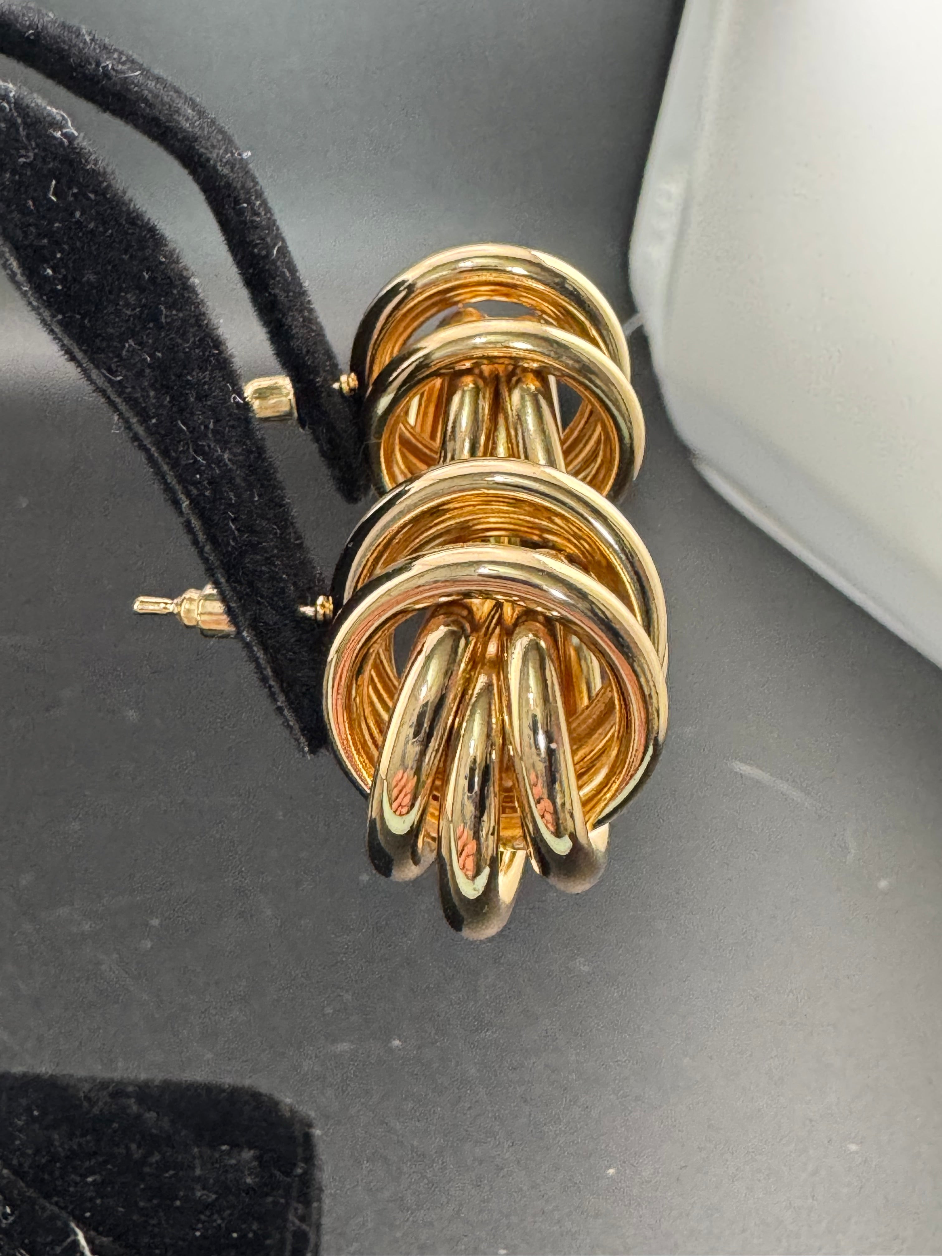Gold tube double knot stud earrings