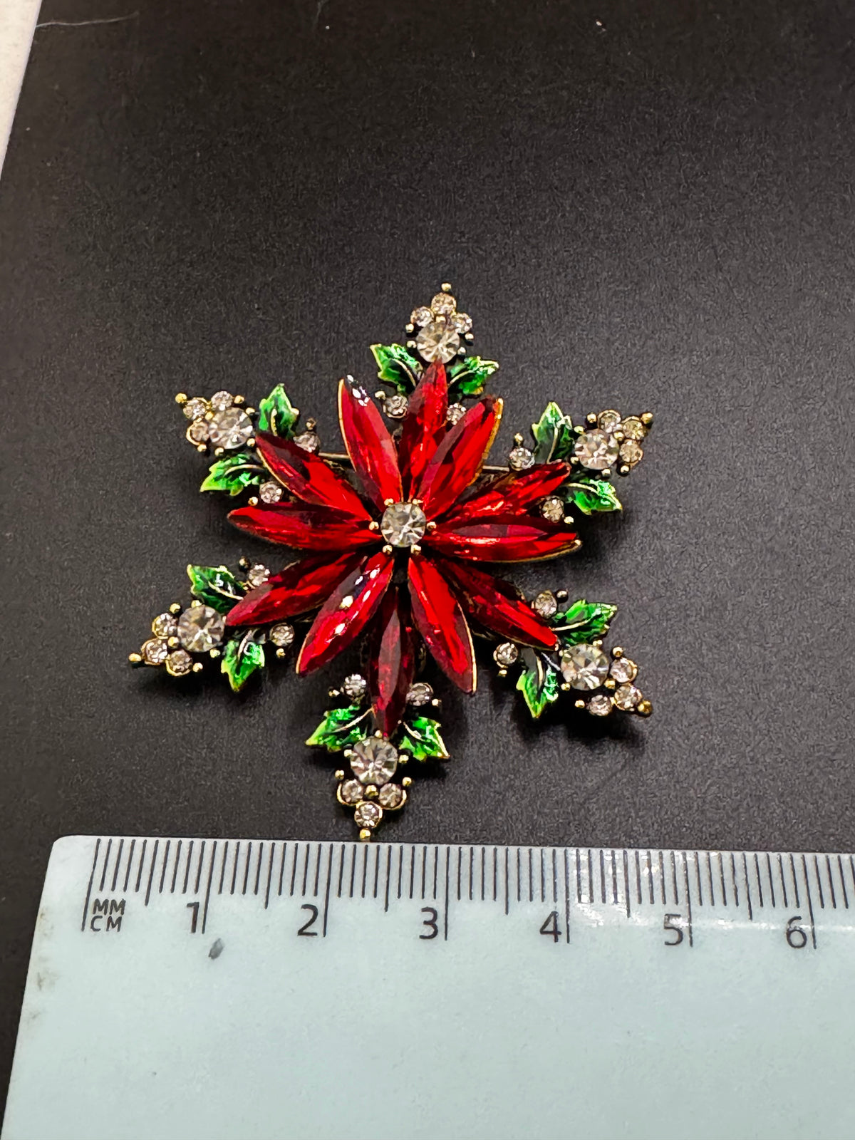 Christmas poinsettia rhinestone flower brooch, red ,green and gold tone festive jewellery
