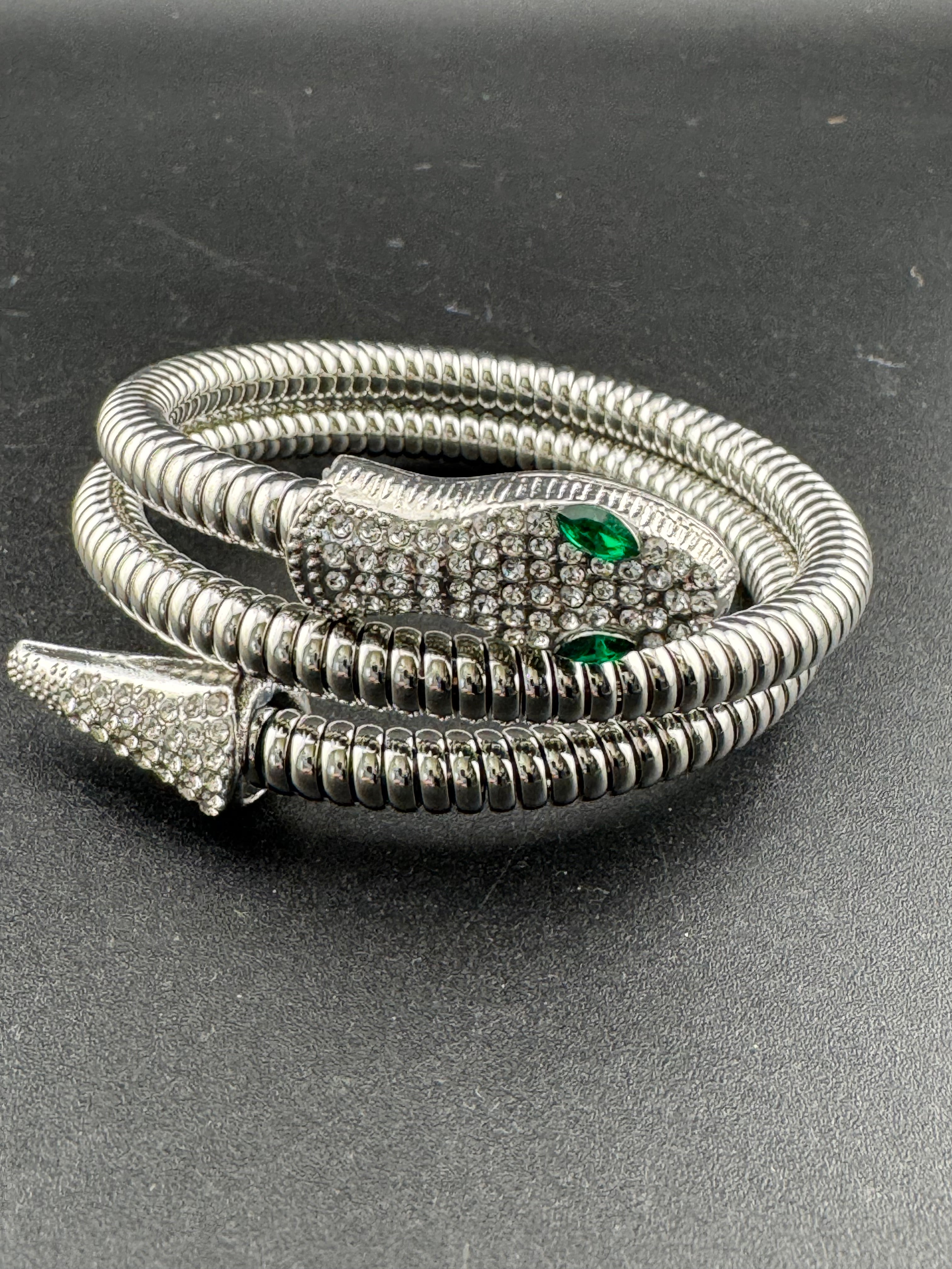 Silver crystal bendy wrap around snake bracelet with emerald eyes