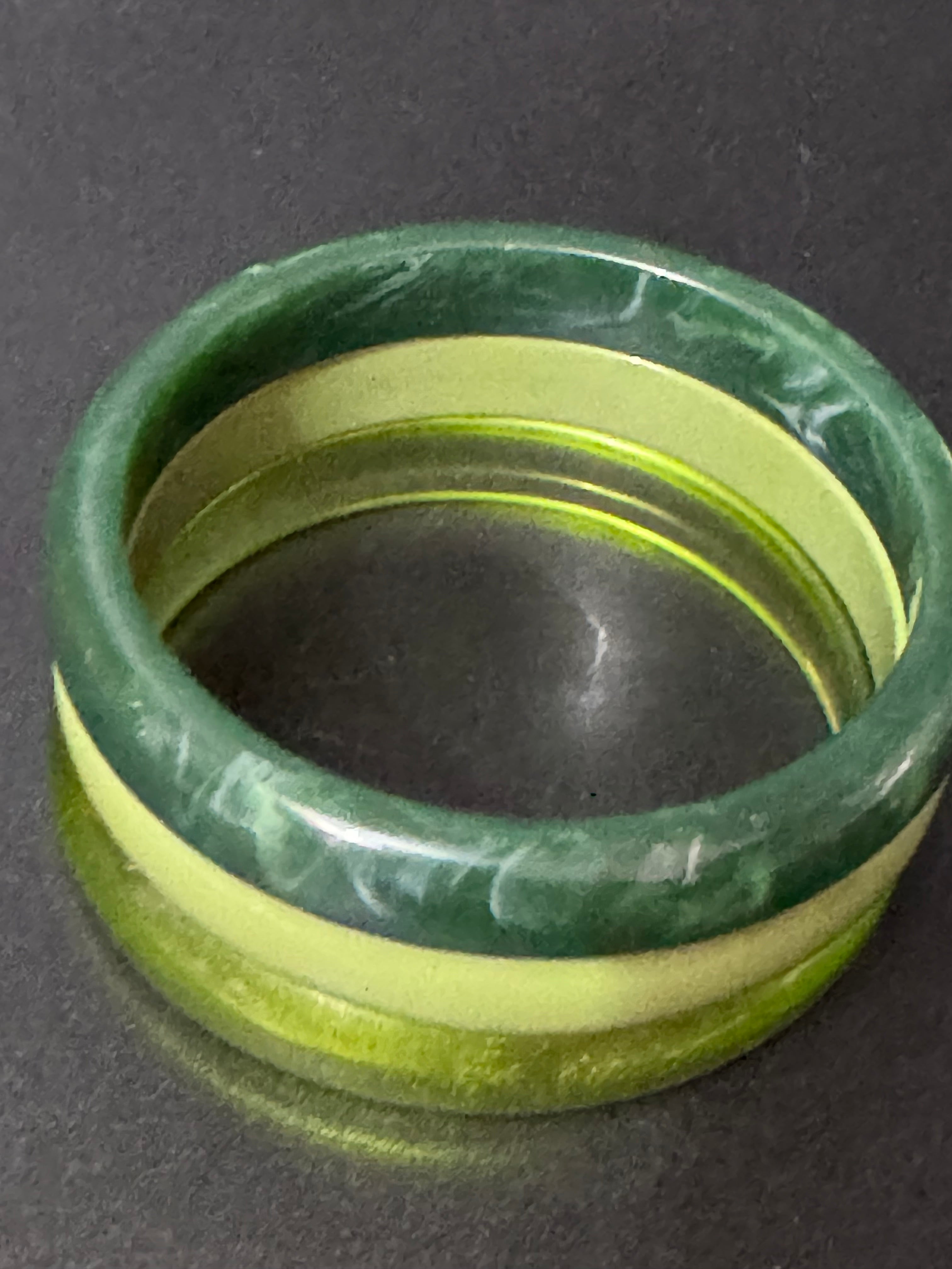 A trio of either orange or green tones mix and match acrylic bangles