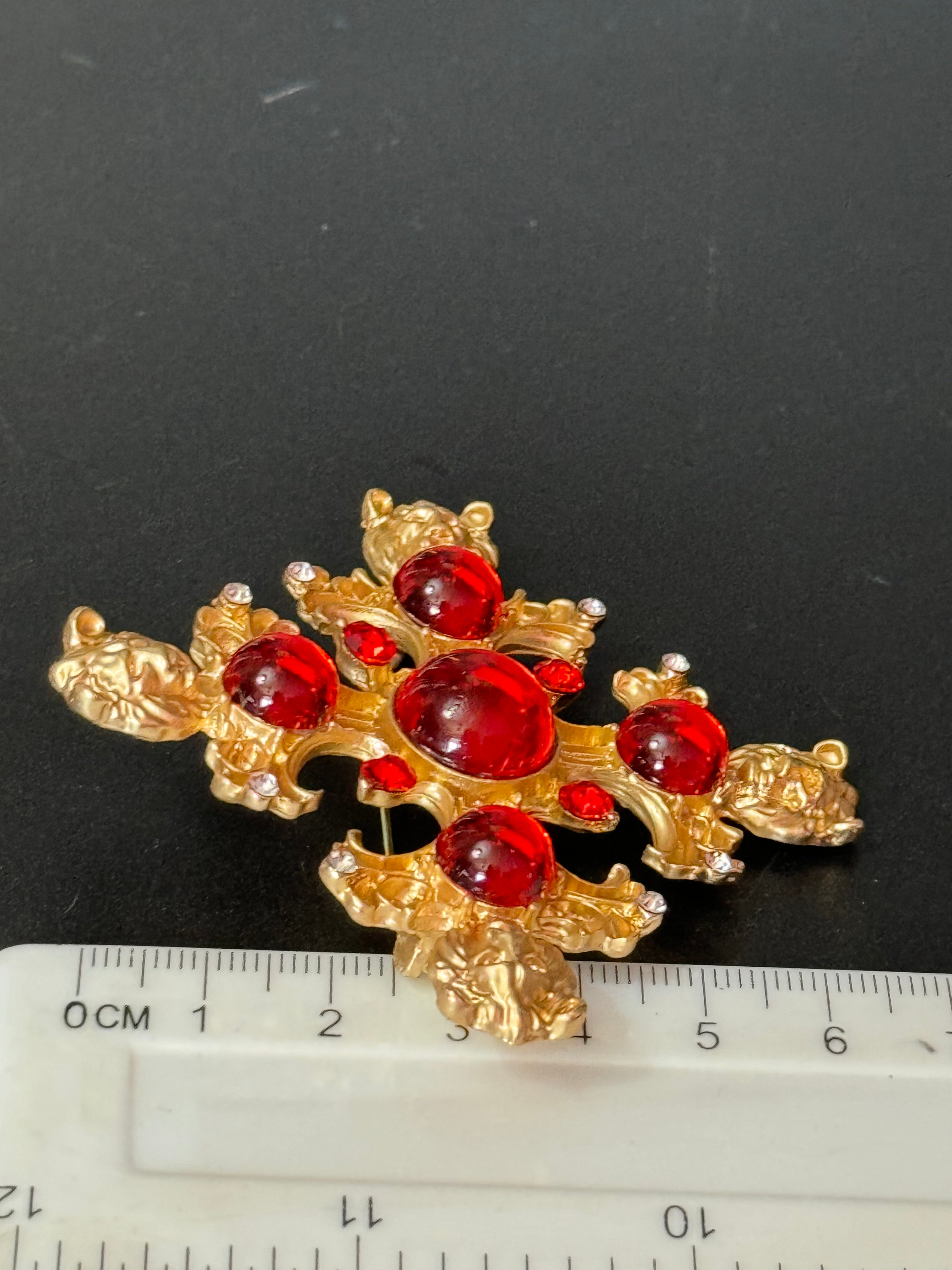 Medieval style Large faux red ruby cabochon matt gold lions head oversized cross brooch