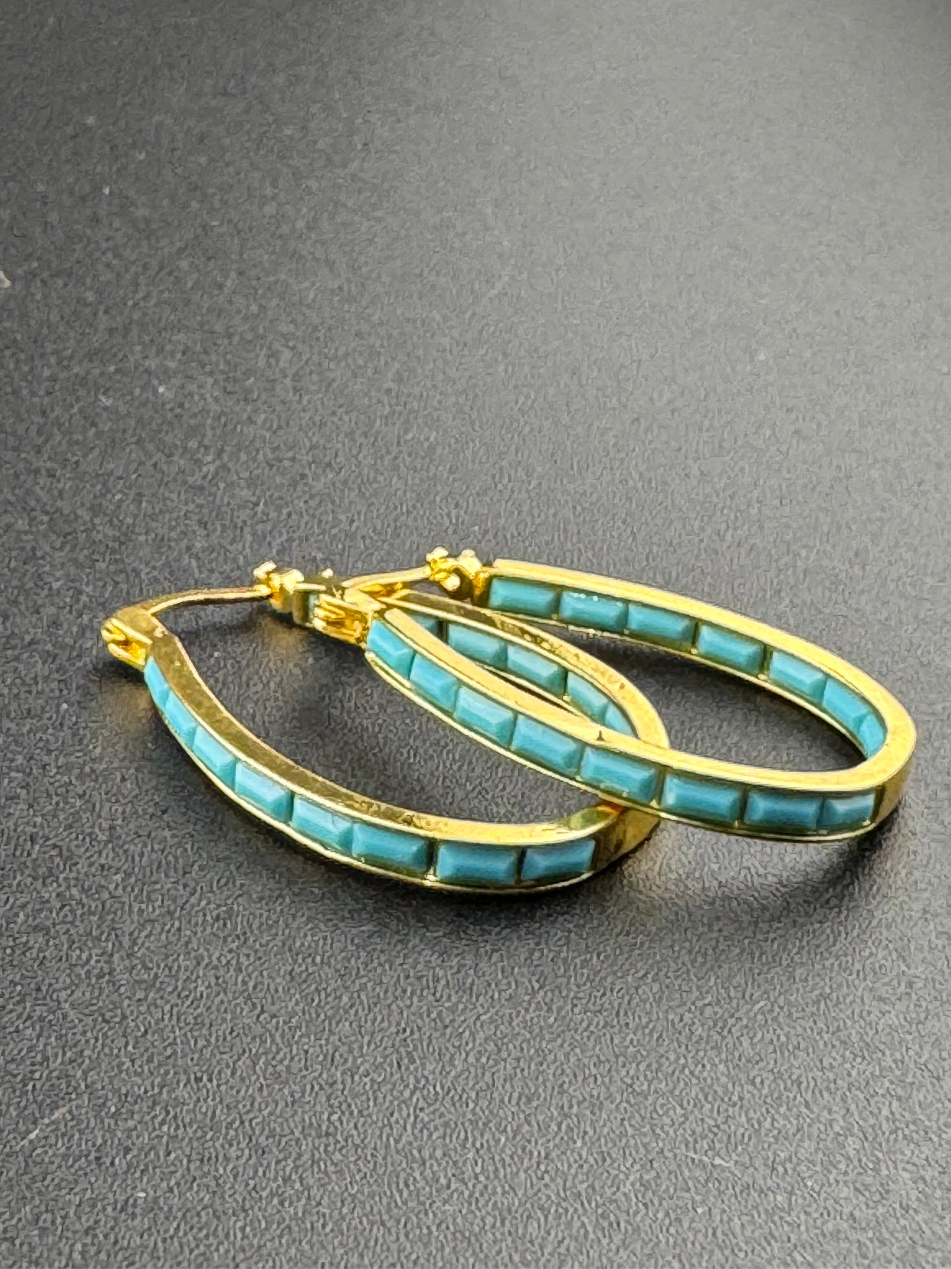 Turquoise blue gold tone oval hoop earrings