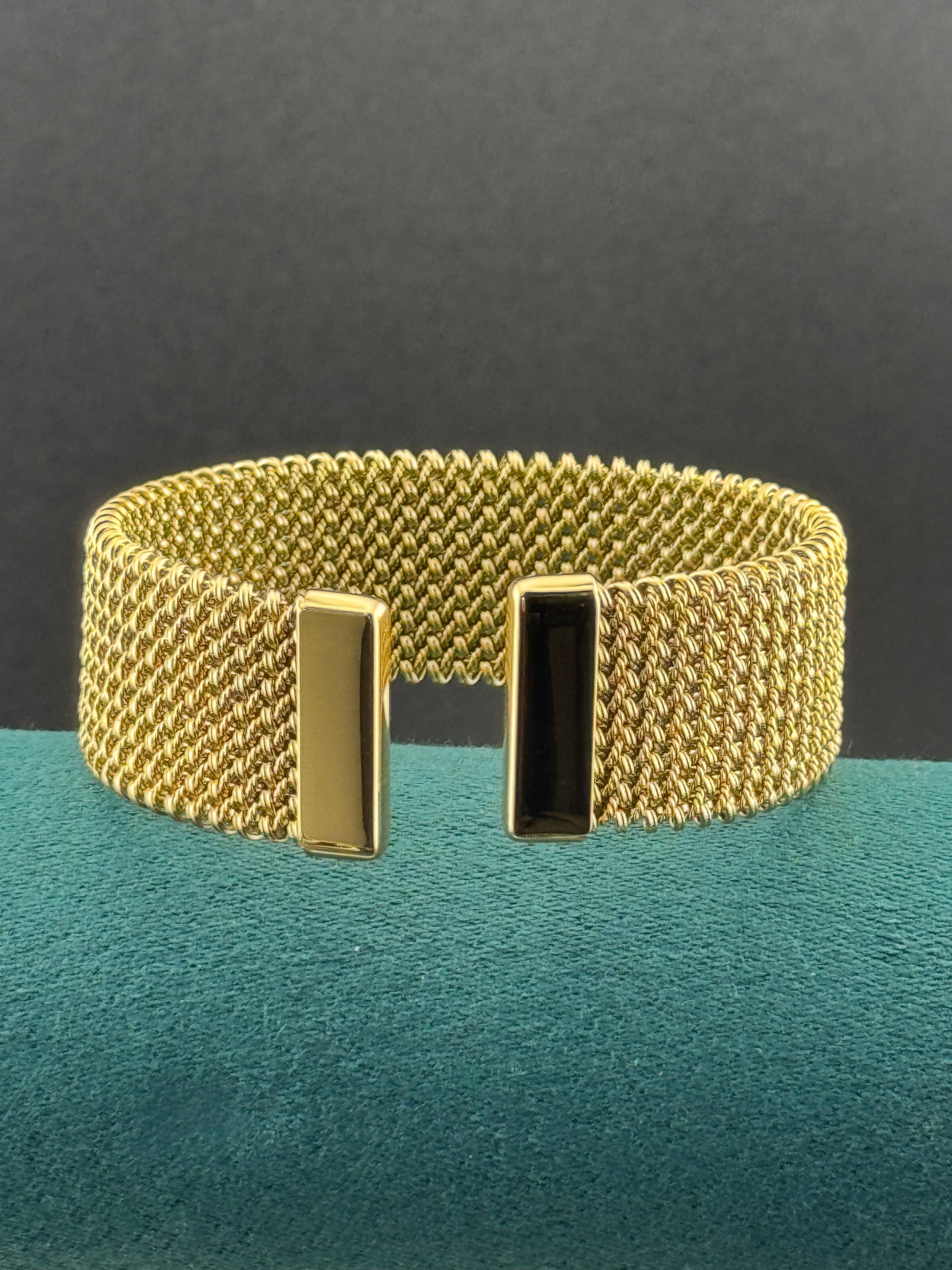 Wide gold toned mesh link open bangle bracelet vintage style