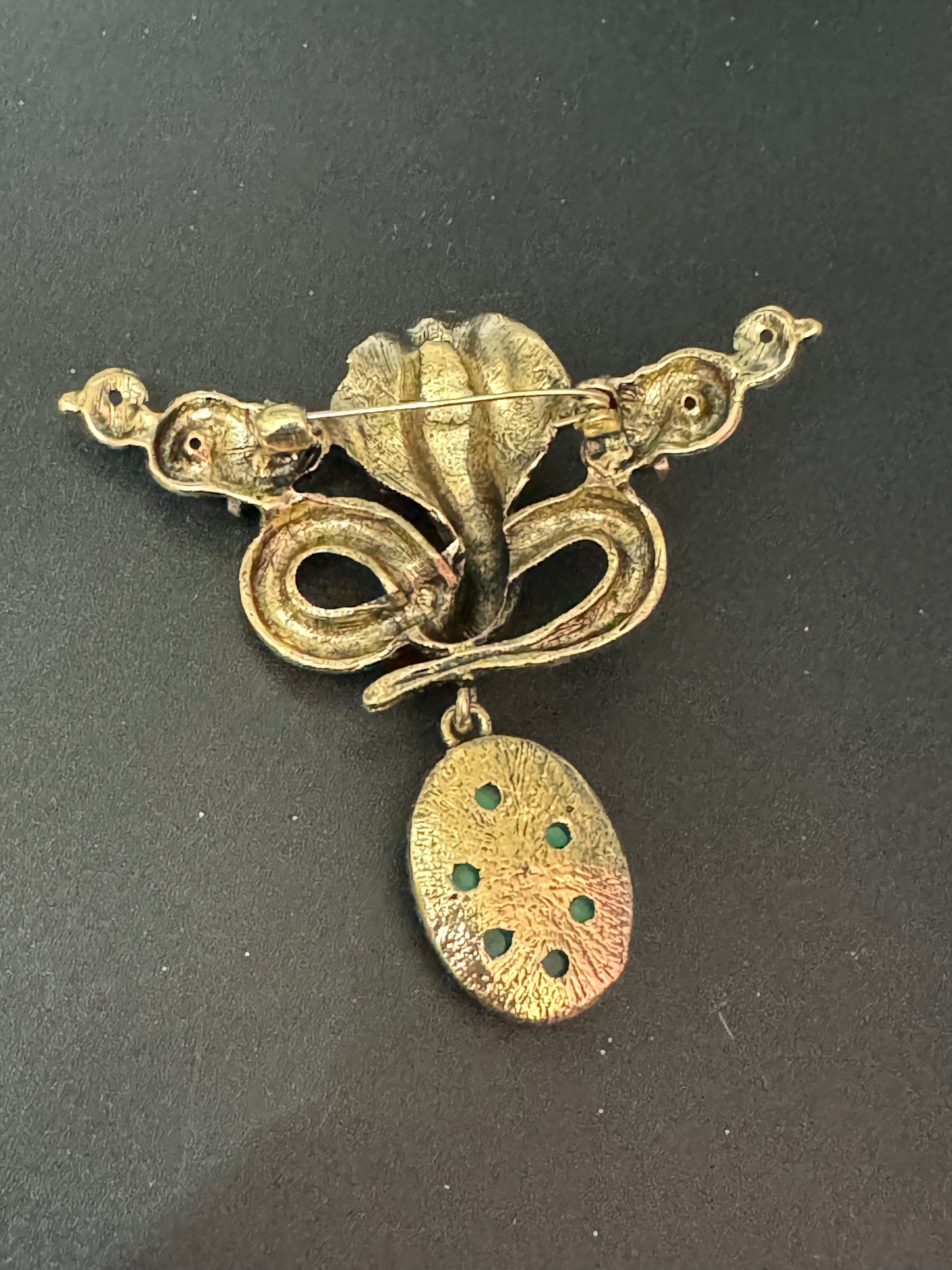 Oversized gold snake brooch with dropper and gemstones
