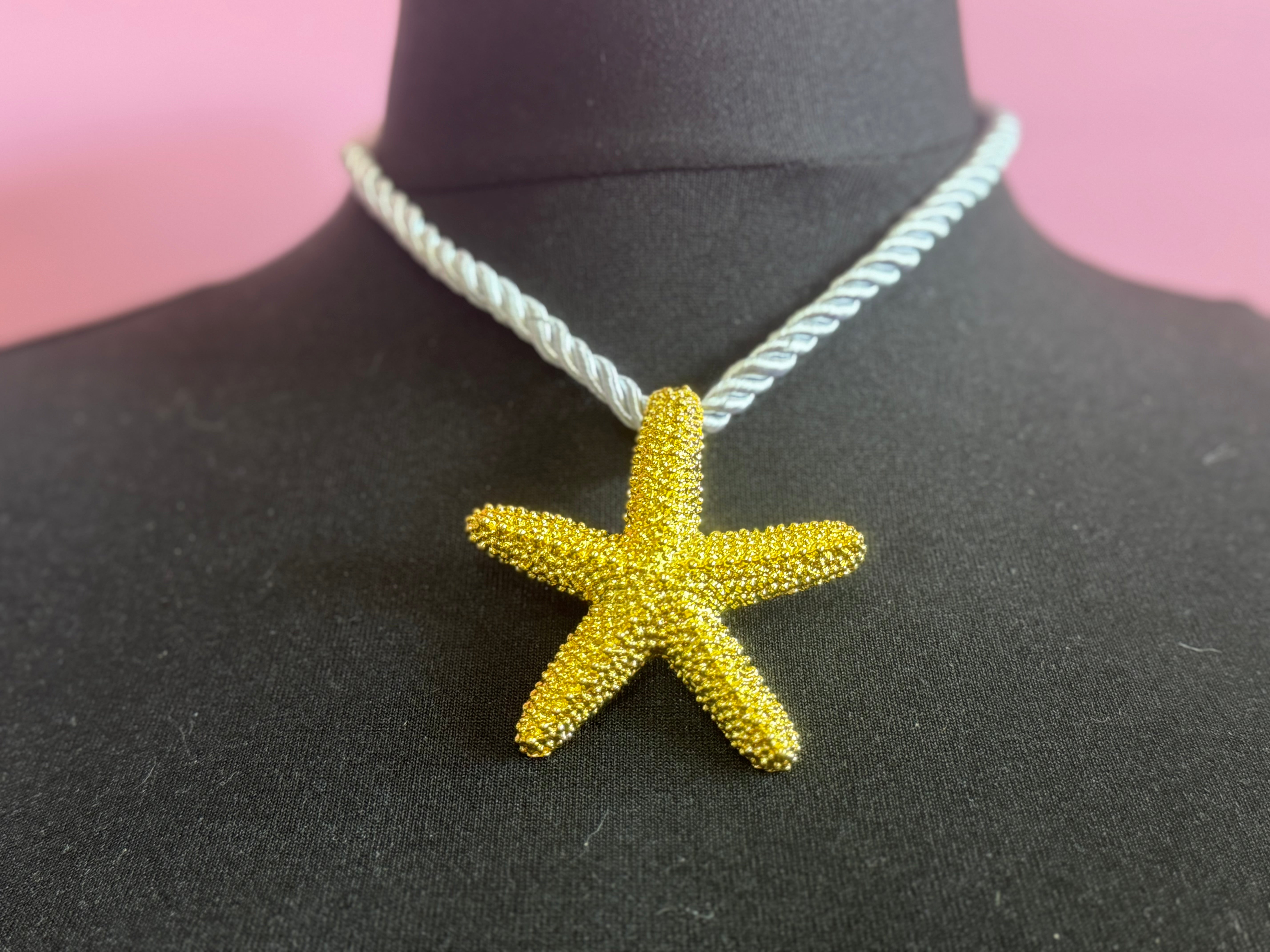 Big gold tone starfish nautical shell necklace on white cord
