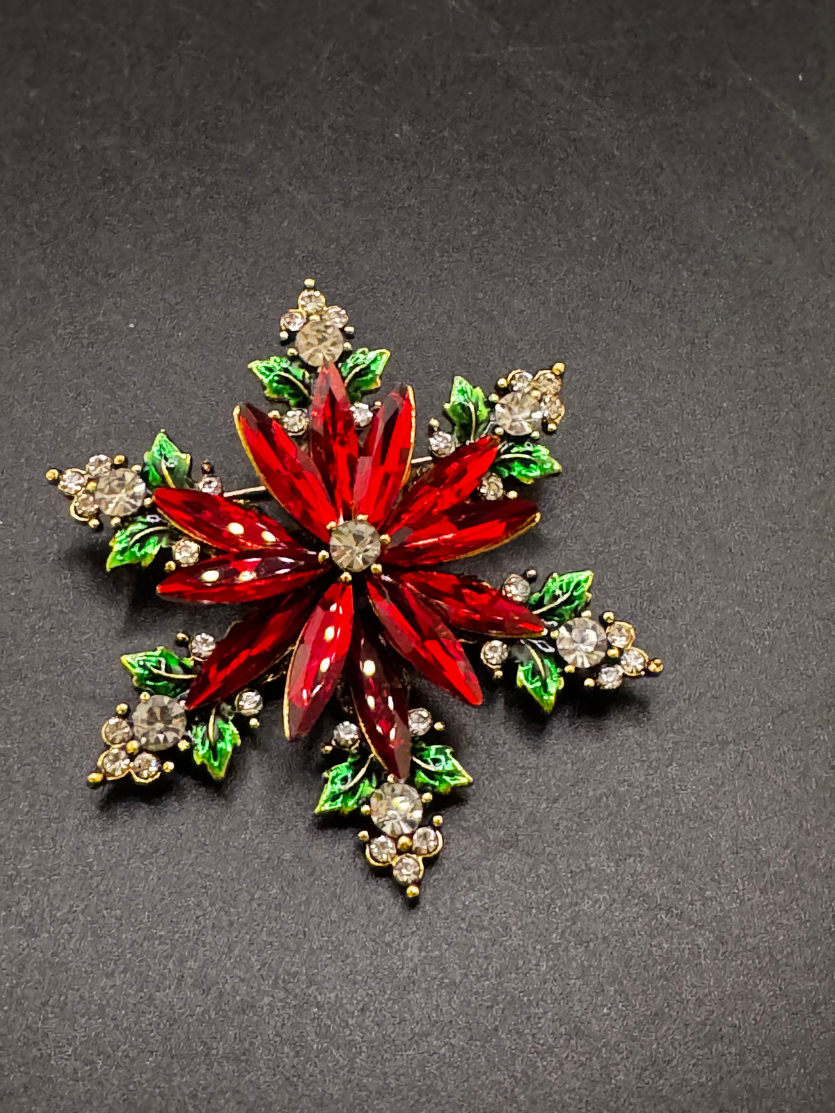 Christmas poinsettia rhinestone flower brooch, red ,green and gold tone festive jewellery