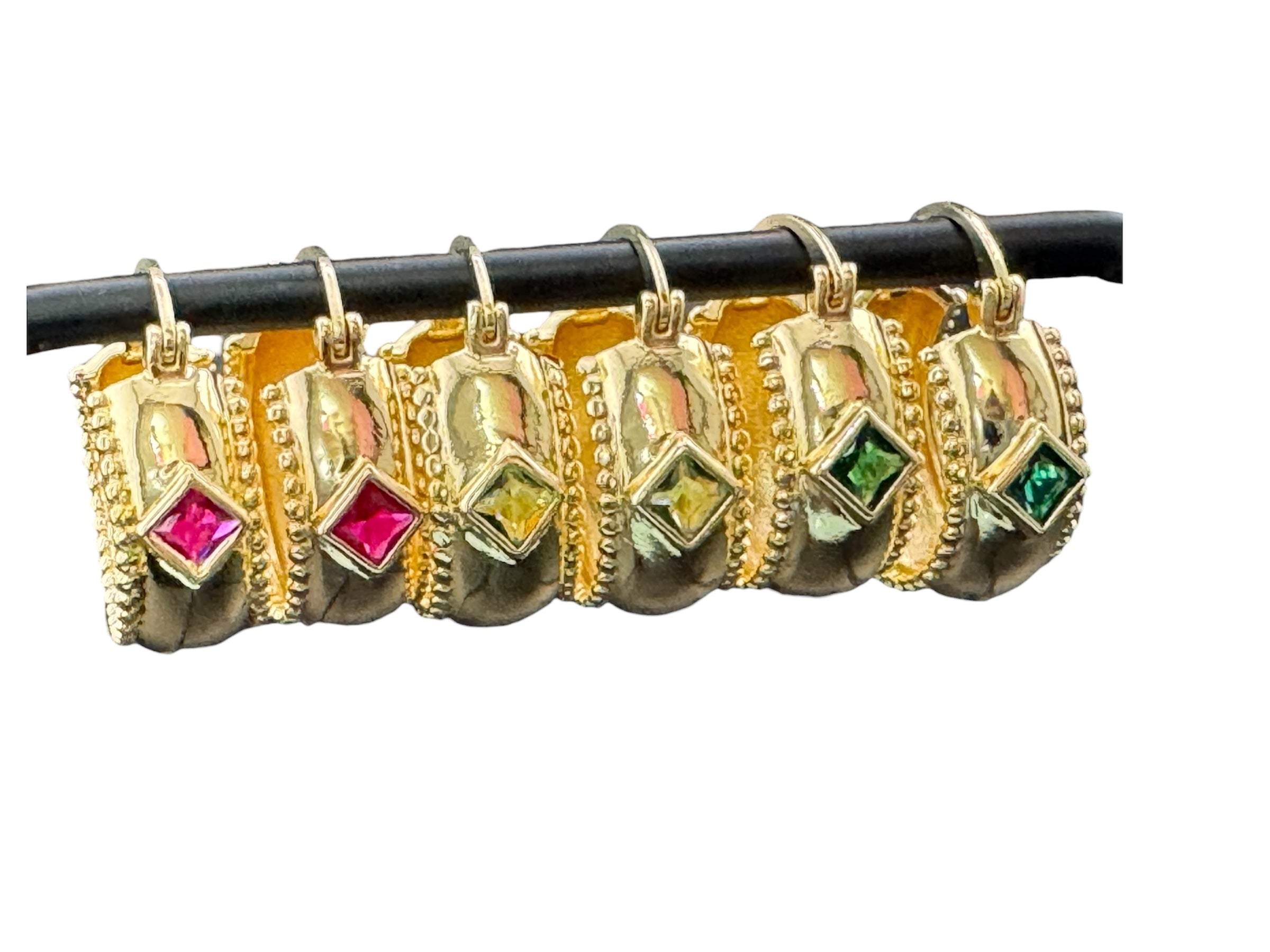 Wide crystal gold hoop earrings with pink emerald and tourmaline crystals