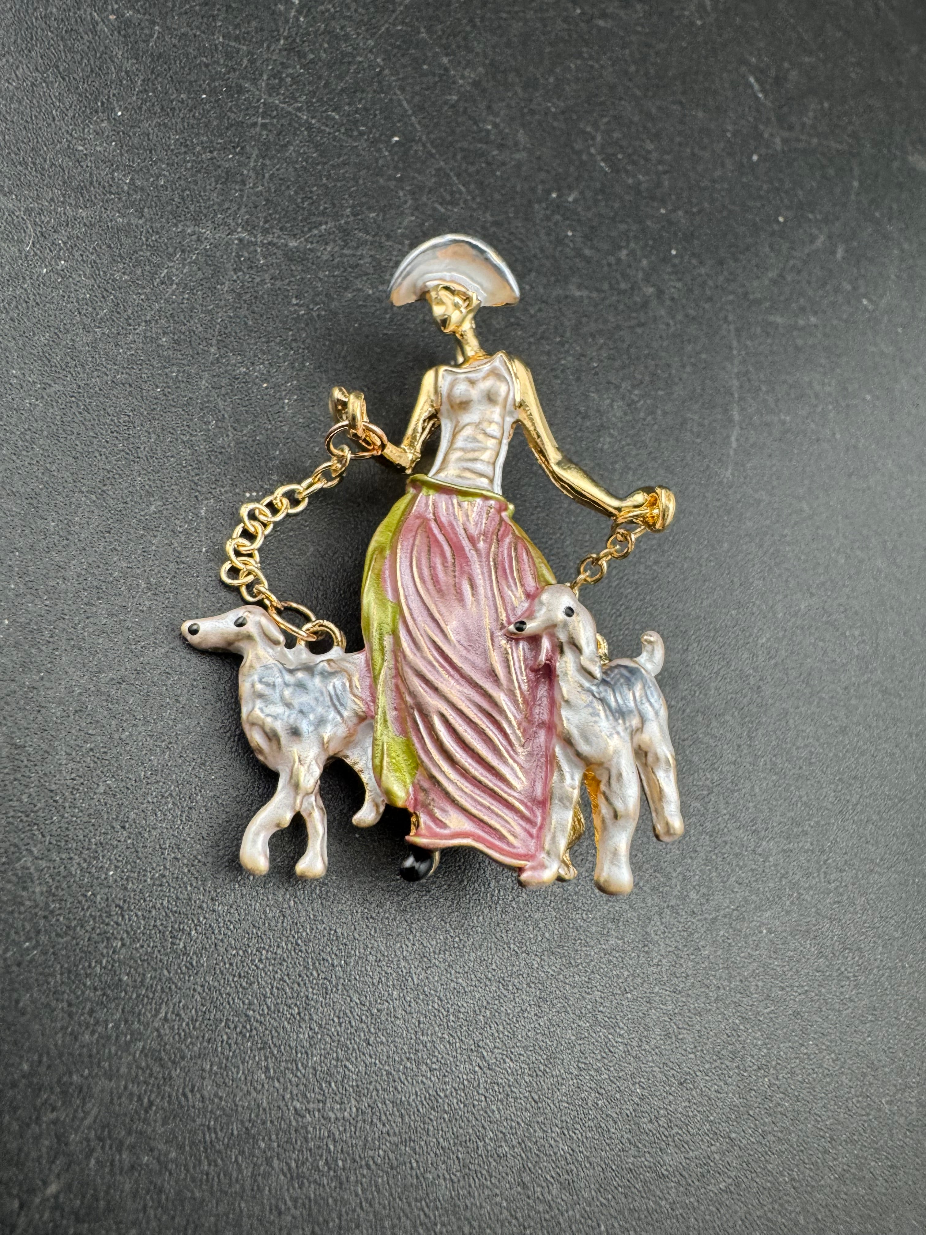 Pink art deco lady with french poodle dogs on leads brooch