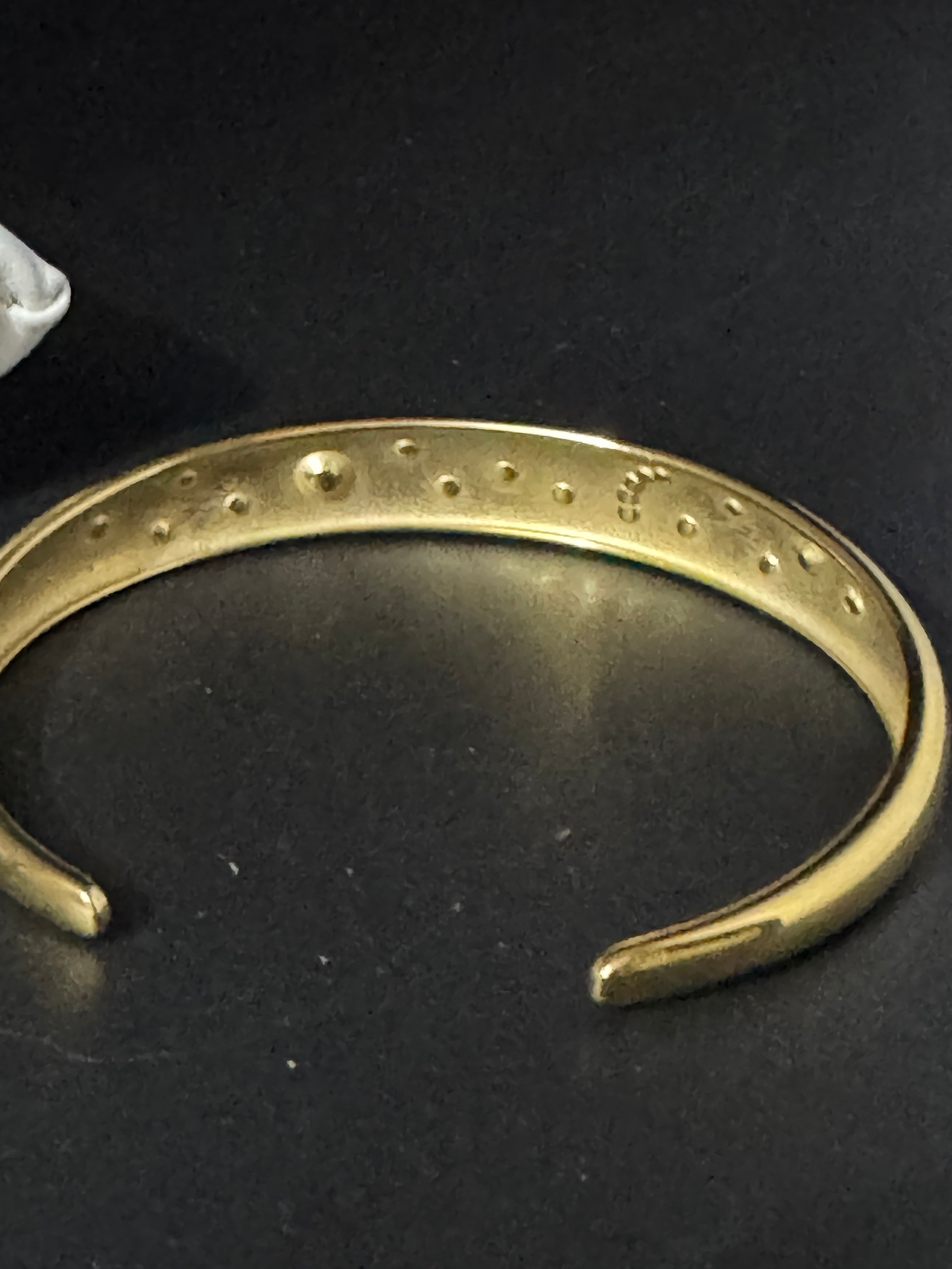 Sun Moon & Stars gold plated open bangle