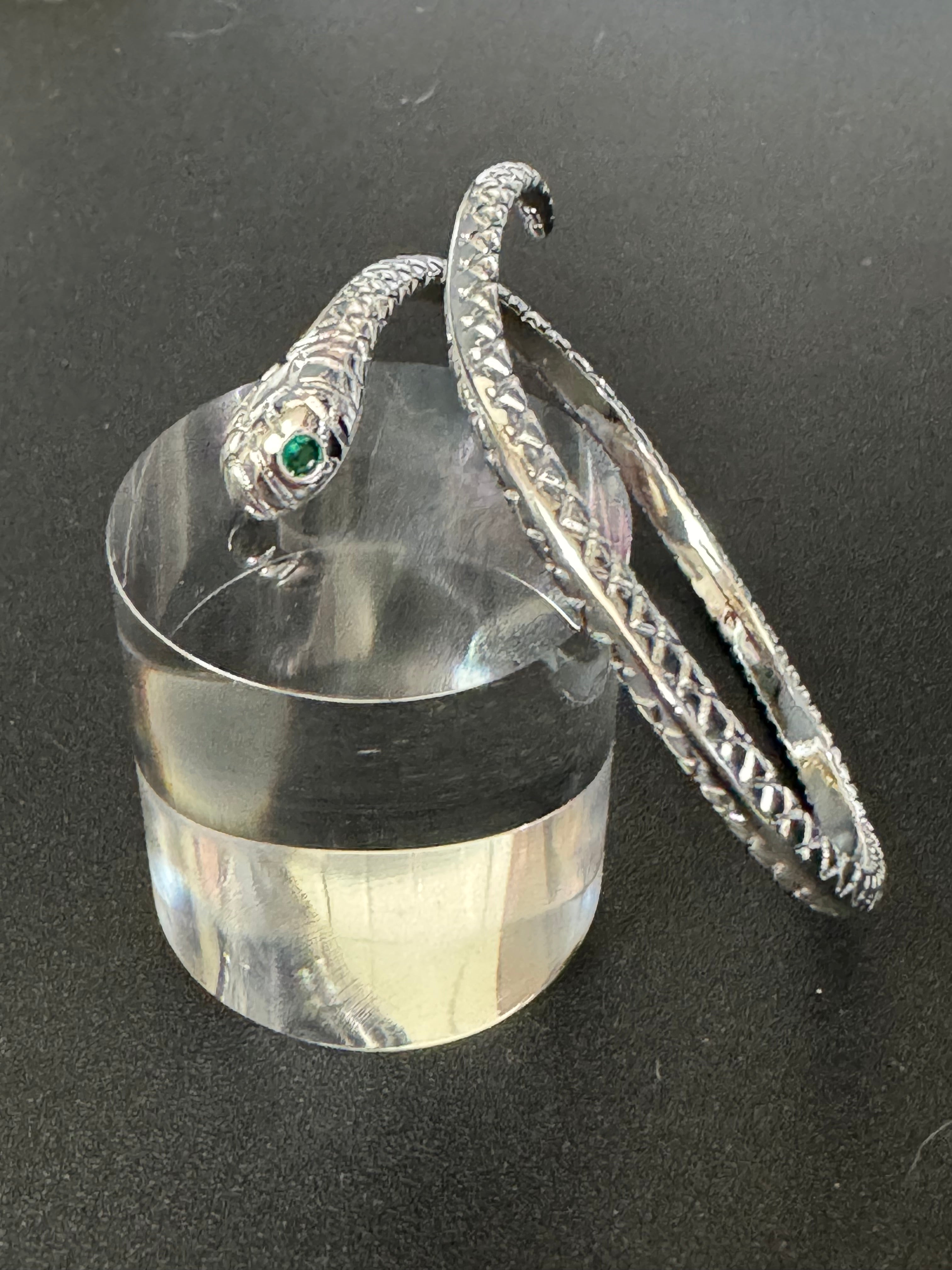 Silver plated snake bracelet with emerald eyes