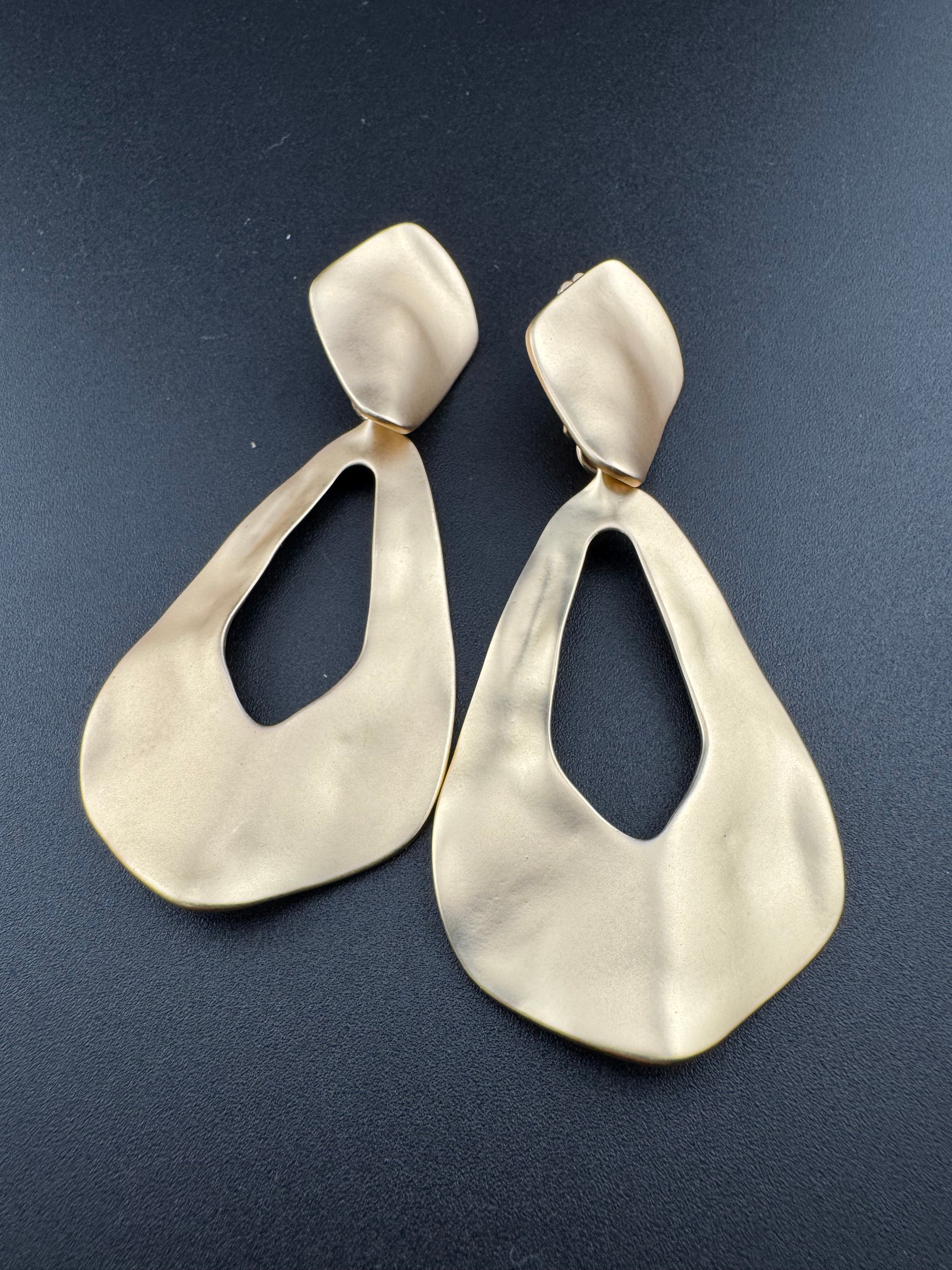 Matt gold tone oversized door knocker clip on earrings, Etruscan style