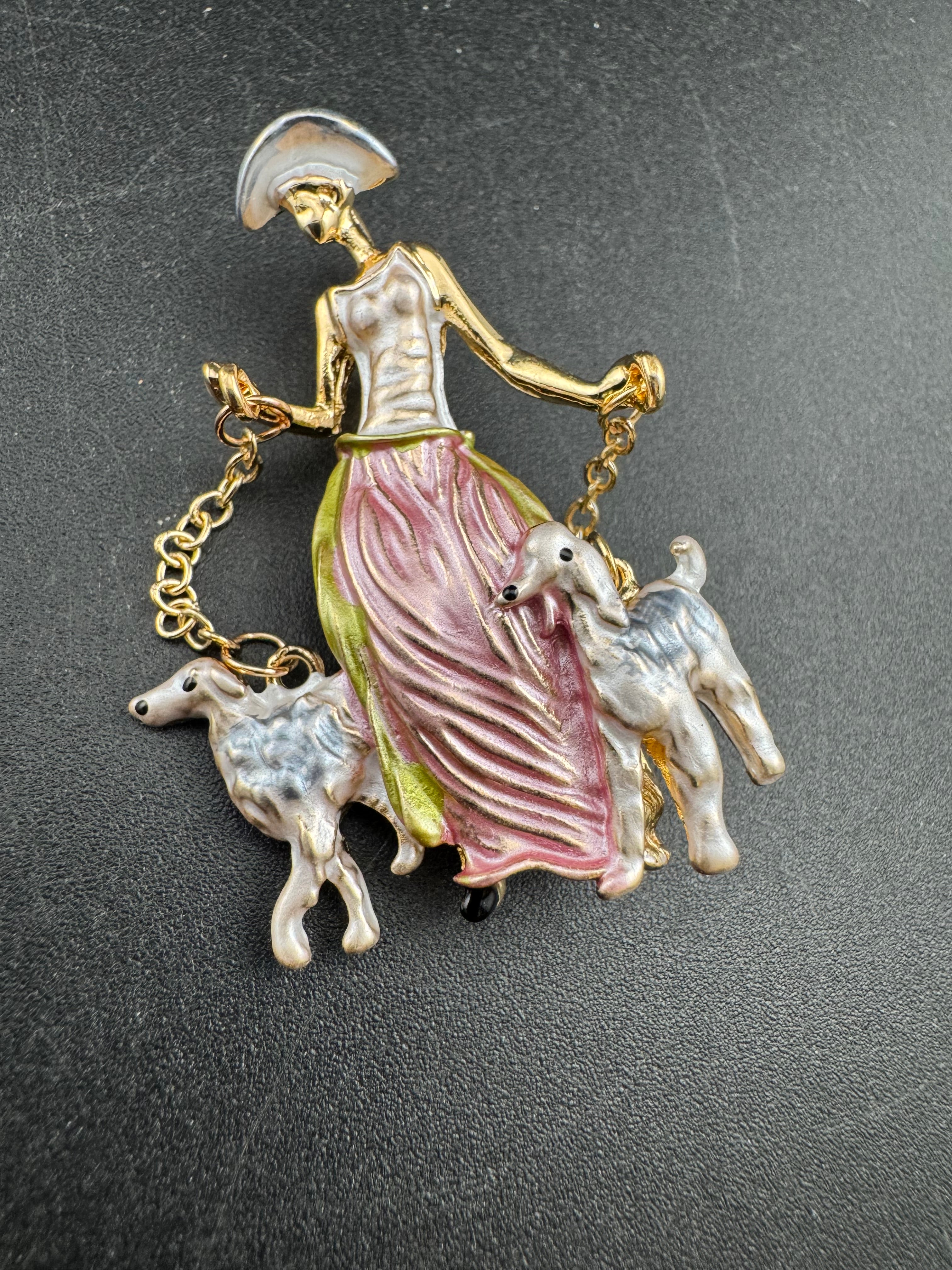 Pink art deco lady with french poodle dogs on leads brooch