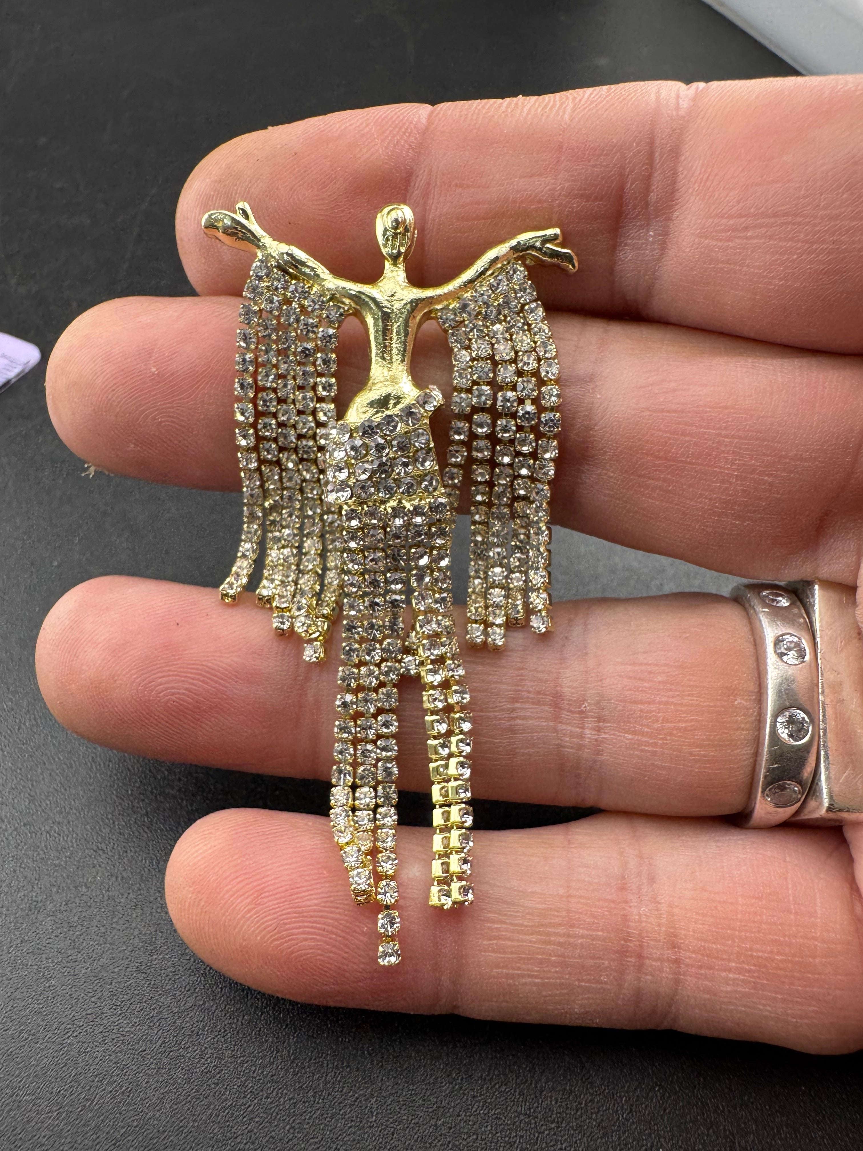 Gold rhinestone diva brooch, diamanté lady waterfall pin