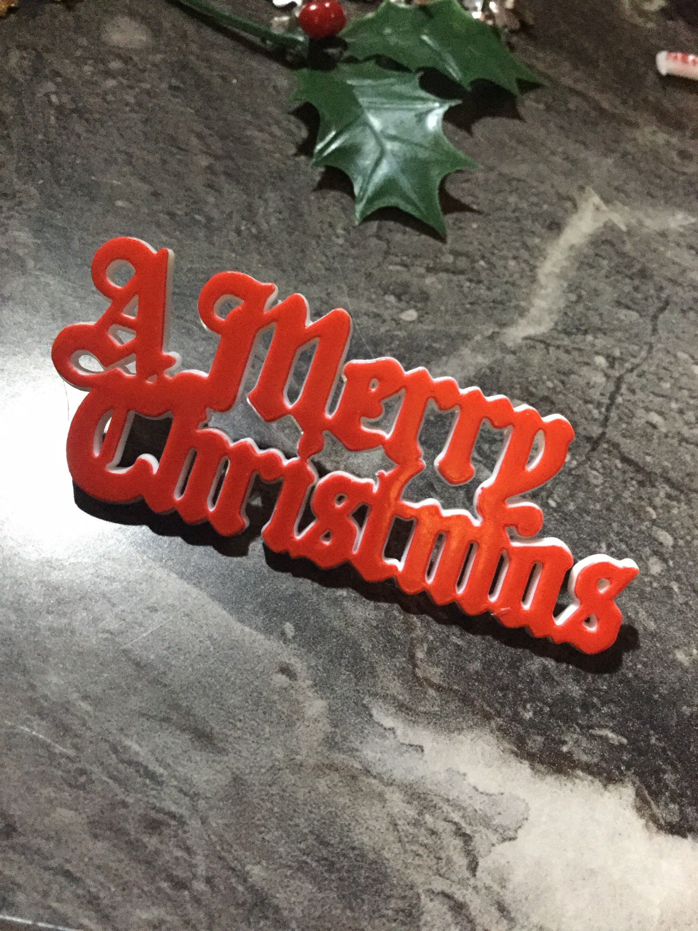 Vintage MERRY CHRISTMAS gold plastic cake topper