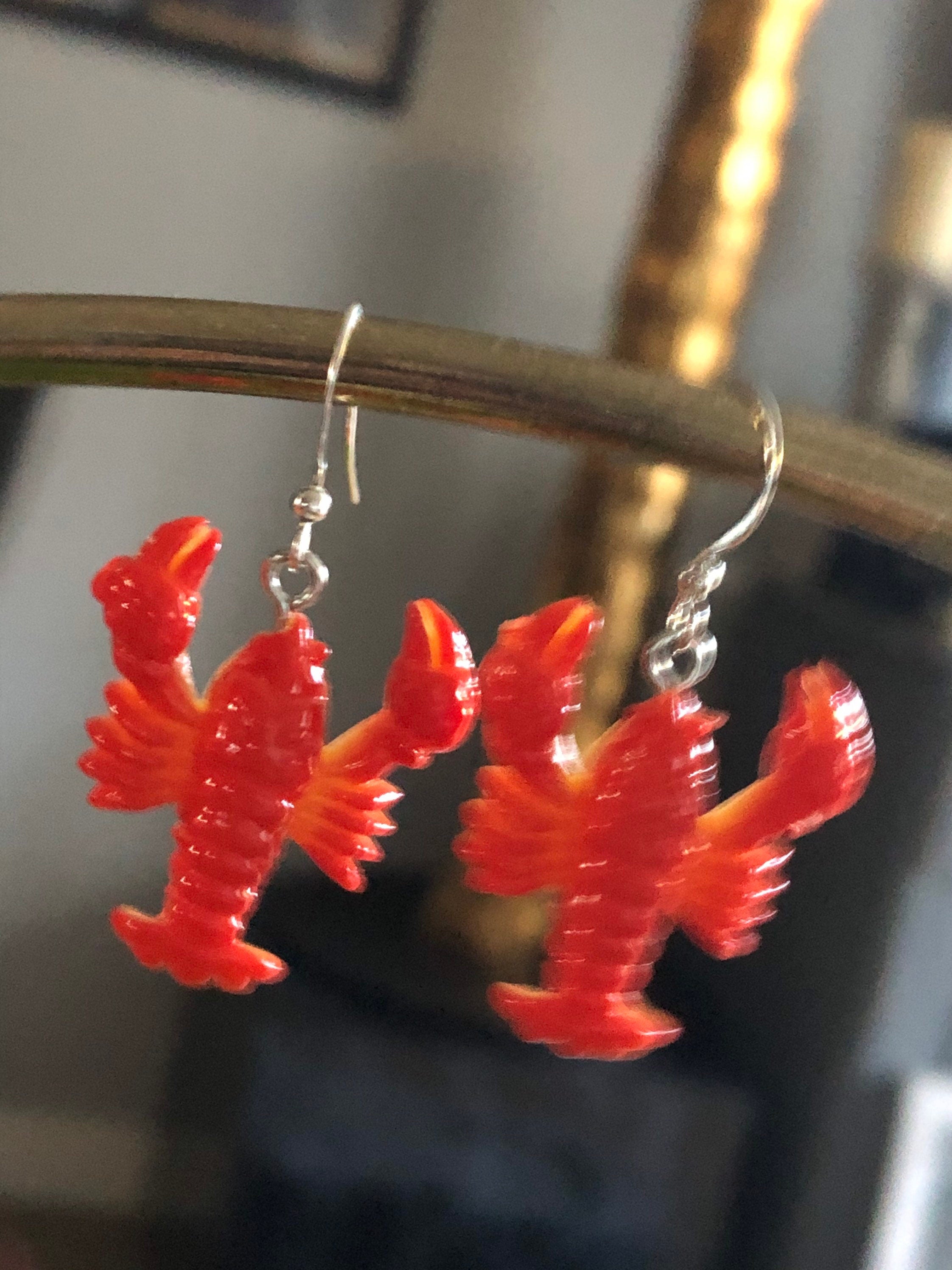 Orange plastic nautical lobster dangly earrings pierced ears