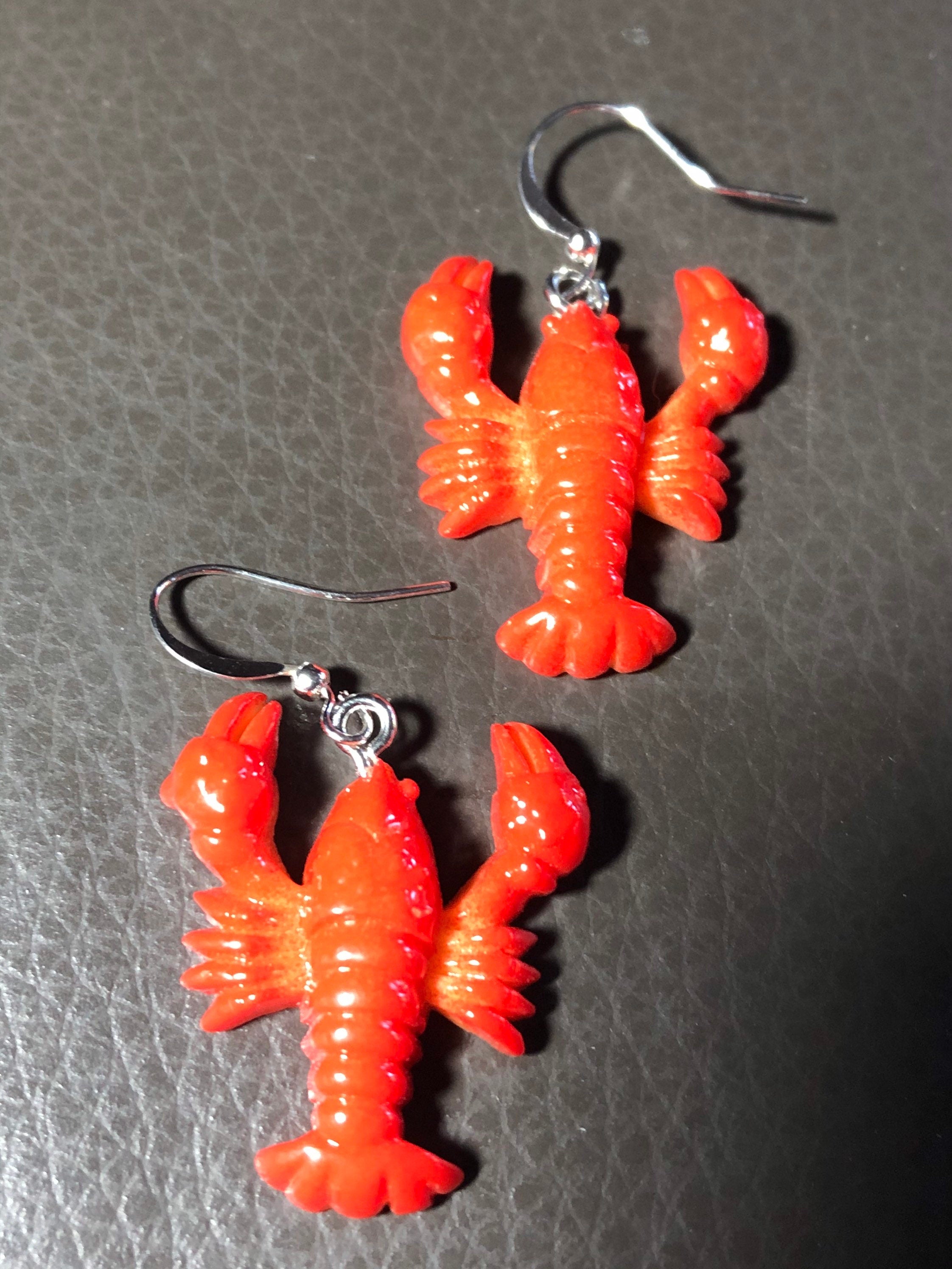 Orange plastic nautical lobster dangly earrings pierced ears