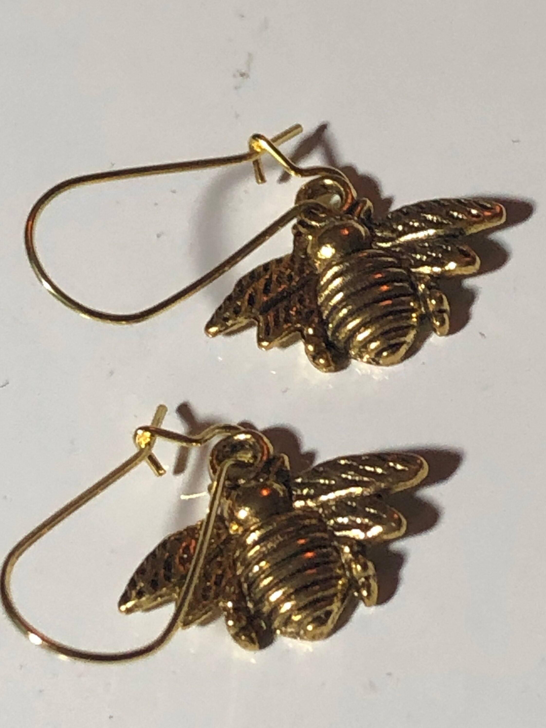 gold tone bumble bee small drop earrings