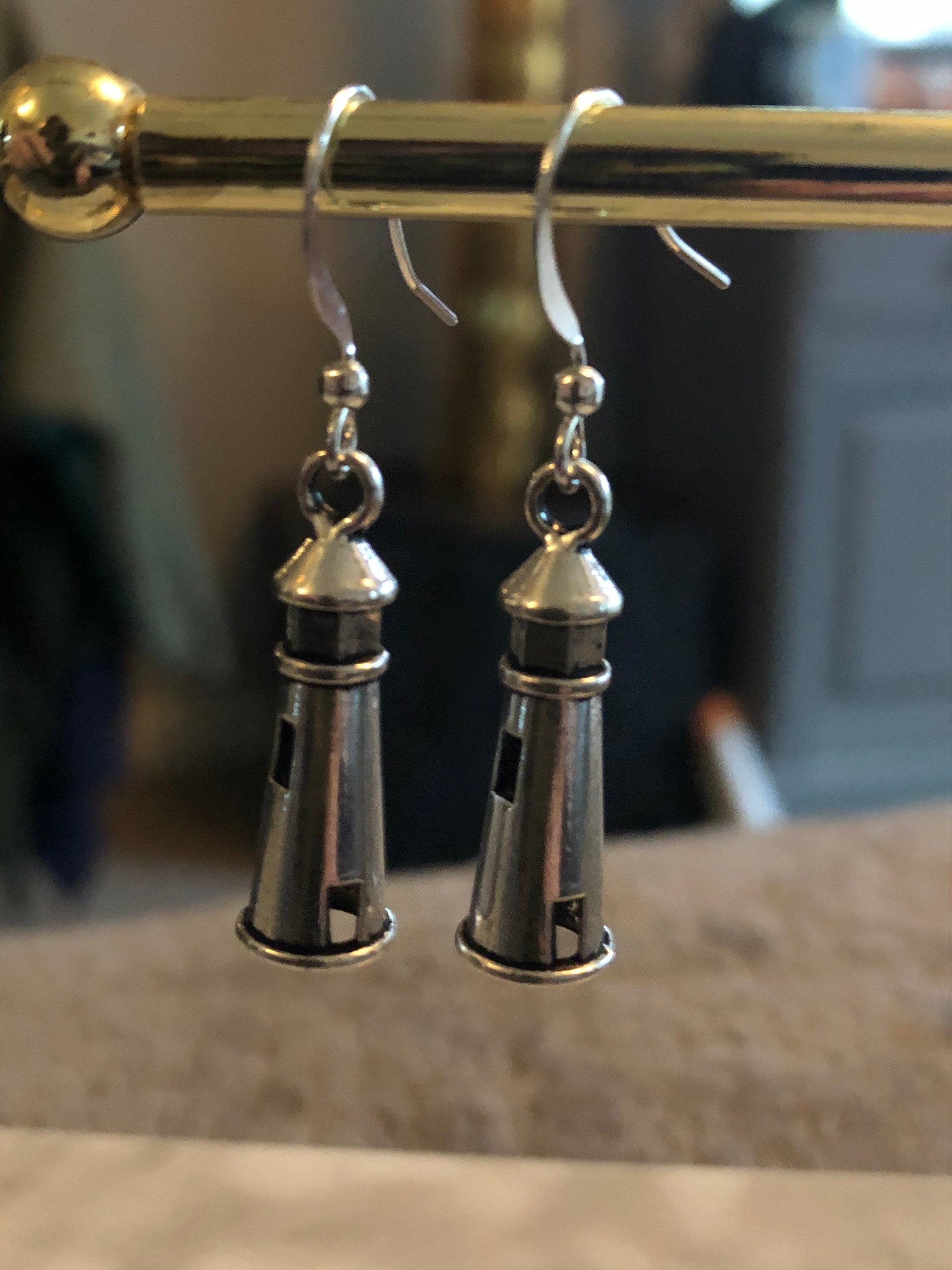 Nautical silver metal lighthouse dangly earrings pierced ears